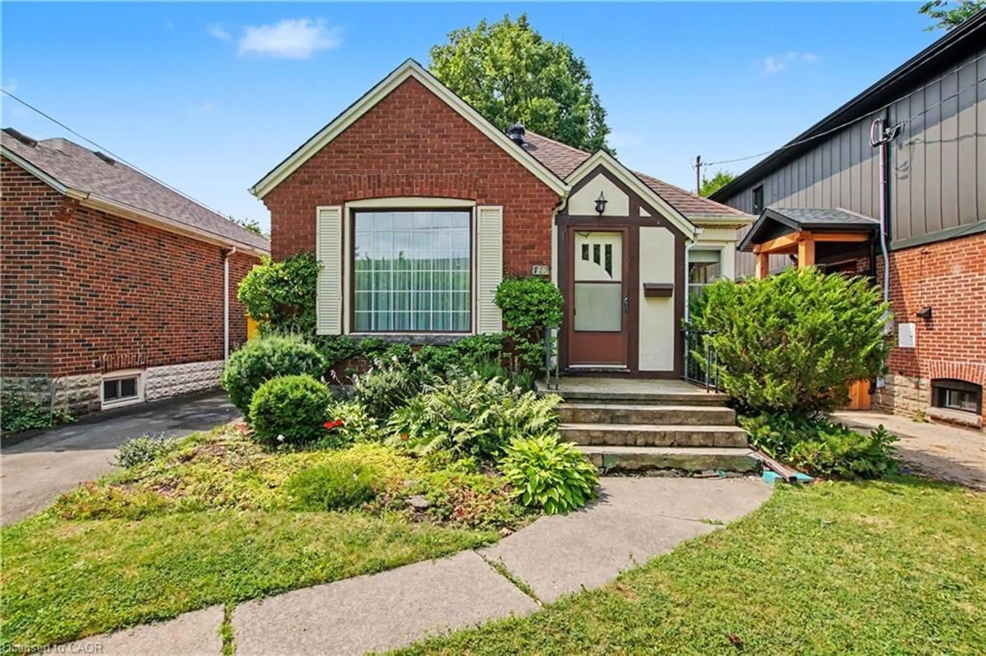 Home with brick exterior material, street for 115 Norwood Rd, Hamilton Ontario L8S 3R3