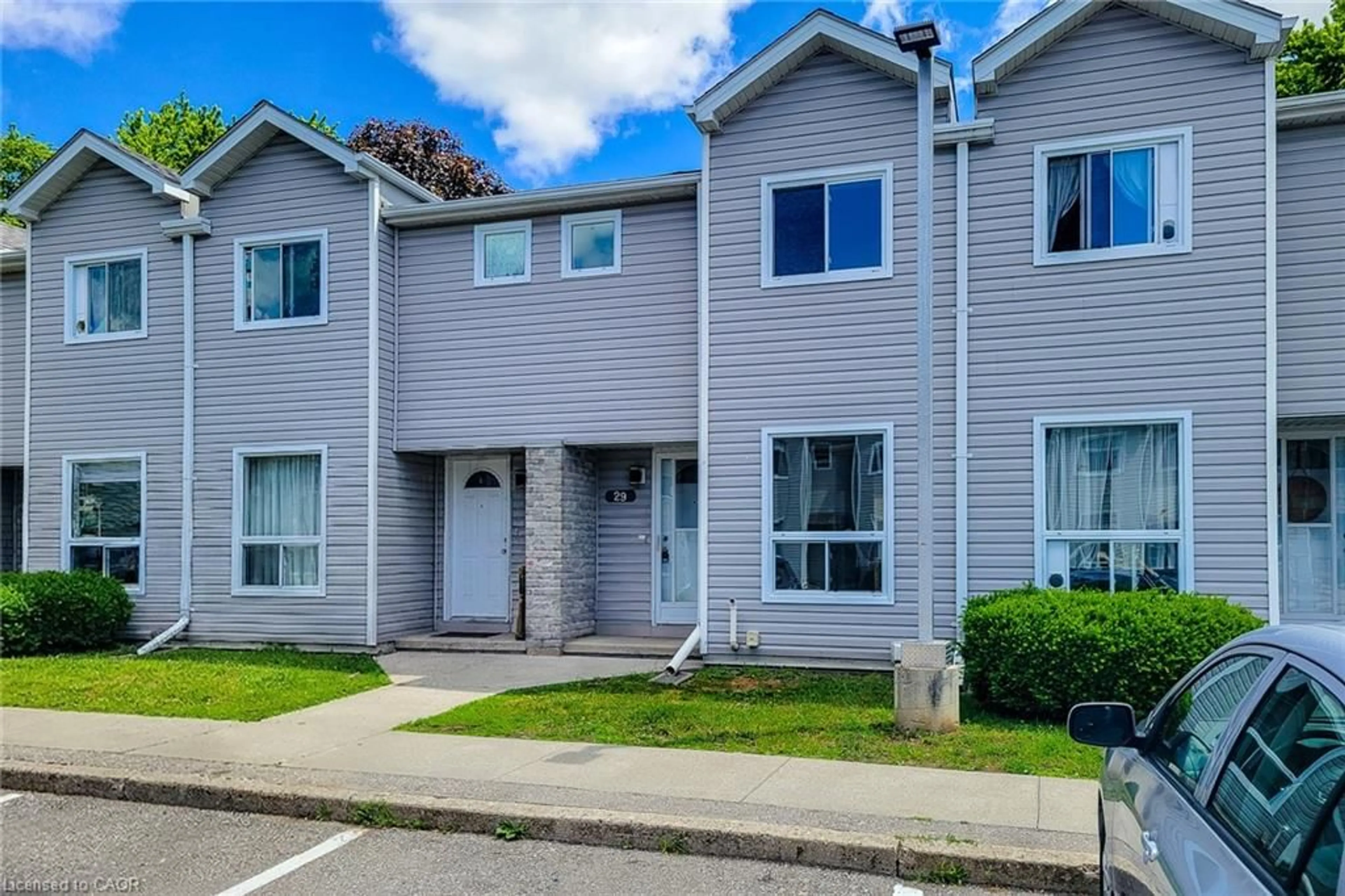Home with vinyl exterior material, street for 488 Grey St #29, Brantford Ontario N3S 7S6