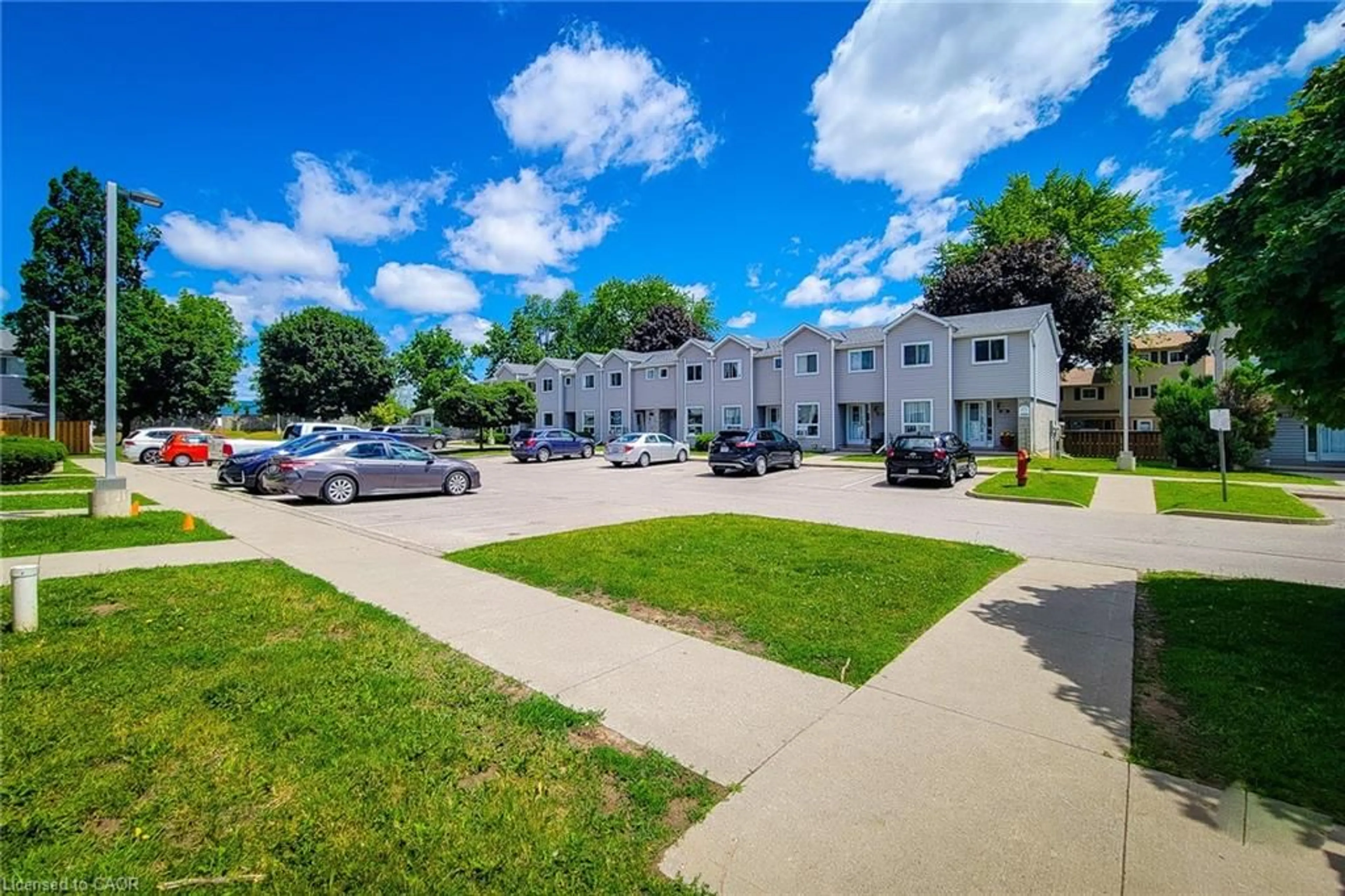 A pic from outside/outdoor area/front of a property/back of a property/a pic from drone, street for 488 Grey St #29, Brantford Ontario N3S 7S6