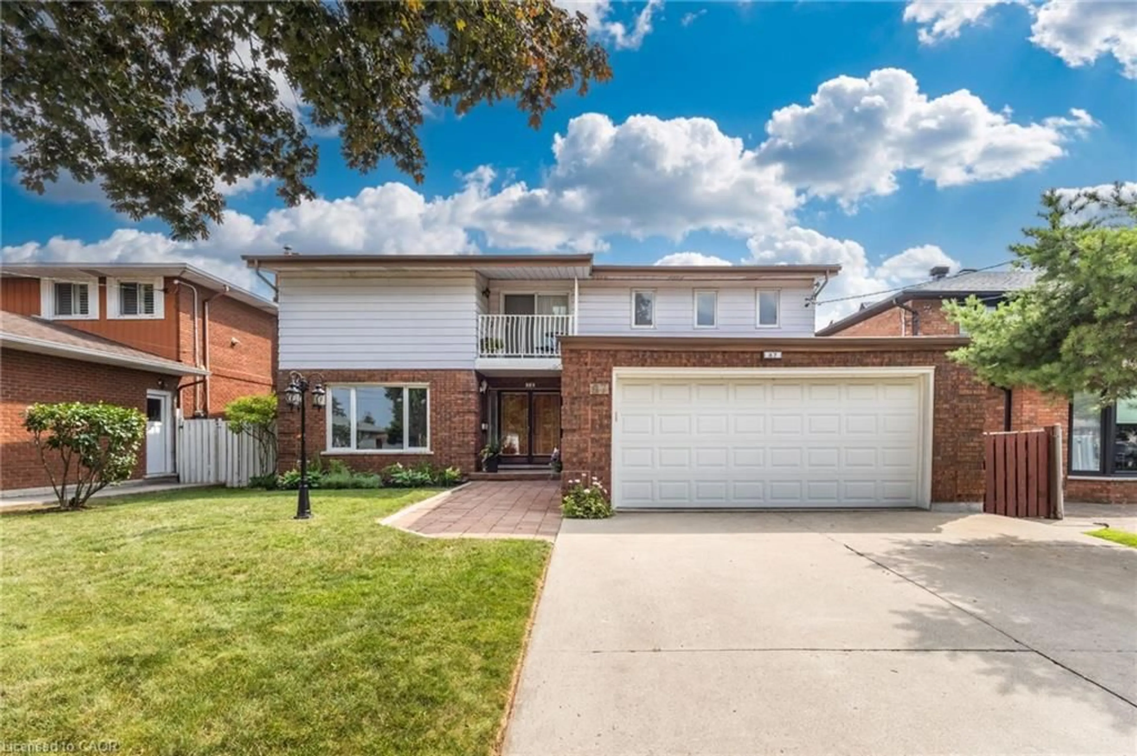 Home with brick exterior material, street for 87 Regent Ave, Hamilton Ontario L9B 1T1