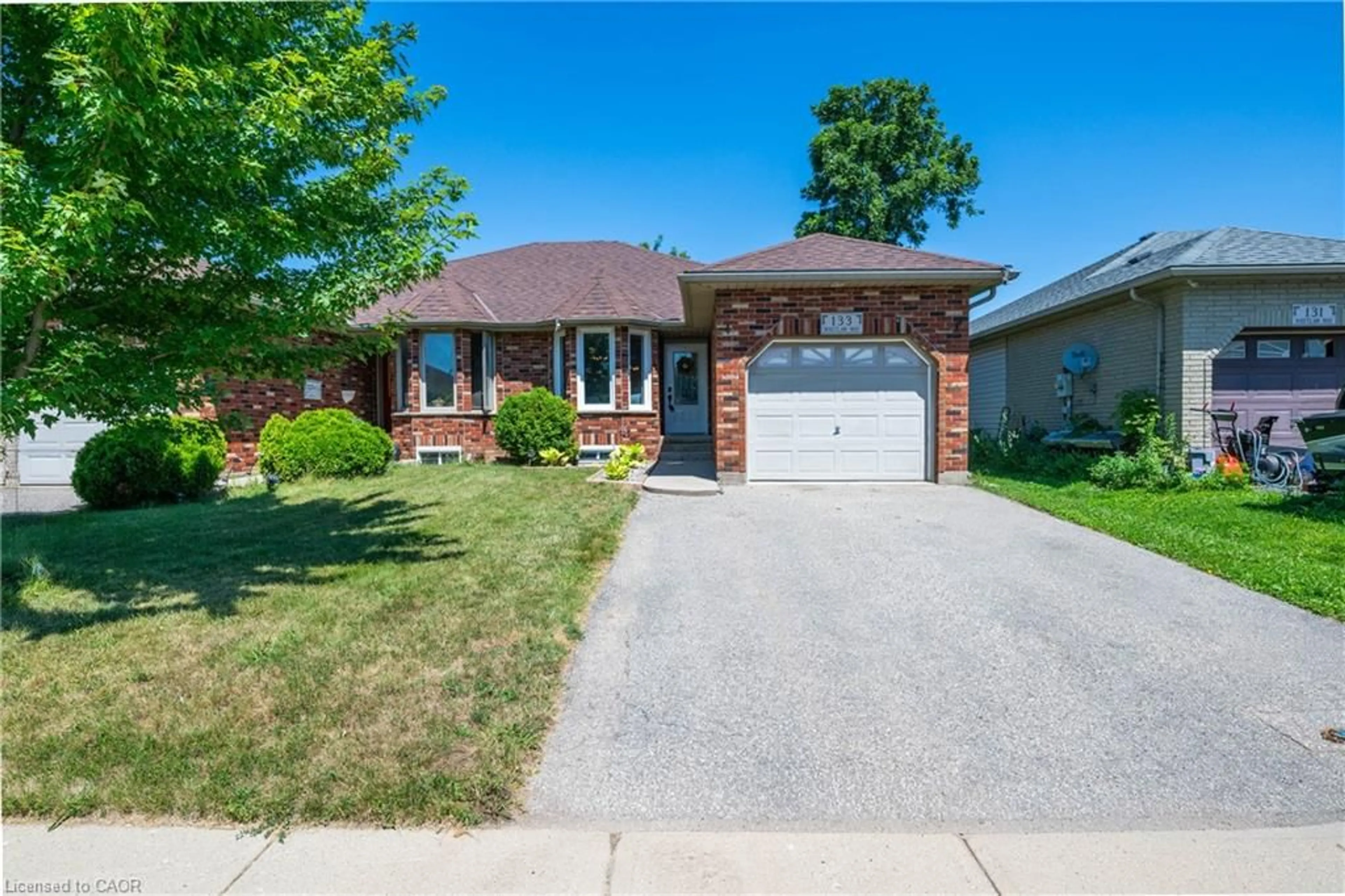 Home with brick exterior material, street for 133 Whitlaw Way, Paris Ontario N3L 4C9