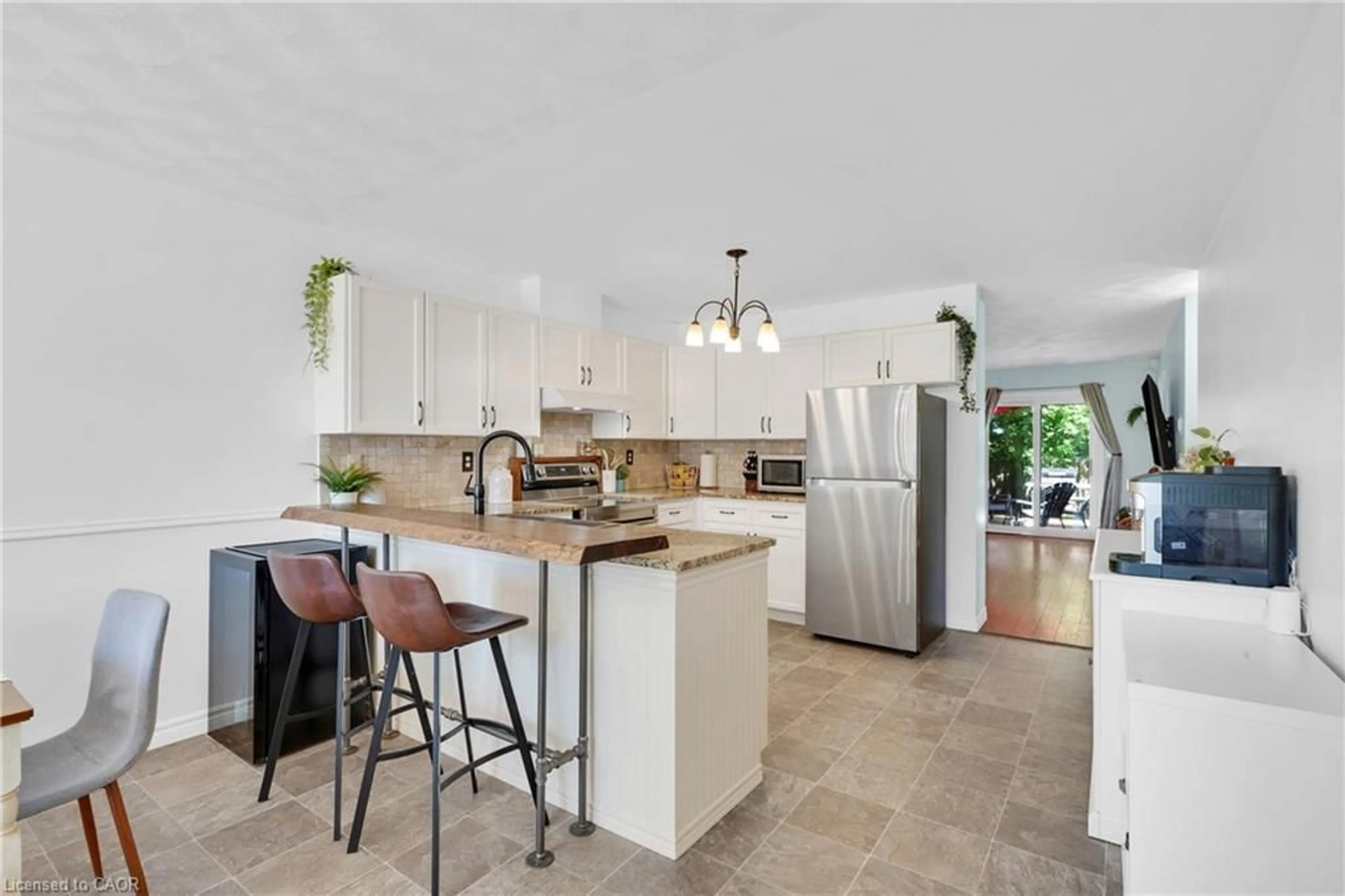 Open concept kitchen, ceramic/tile floor for 133 Whitlaw Way, Paris Ontario N3L 4C9