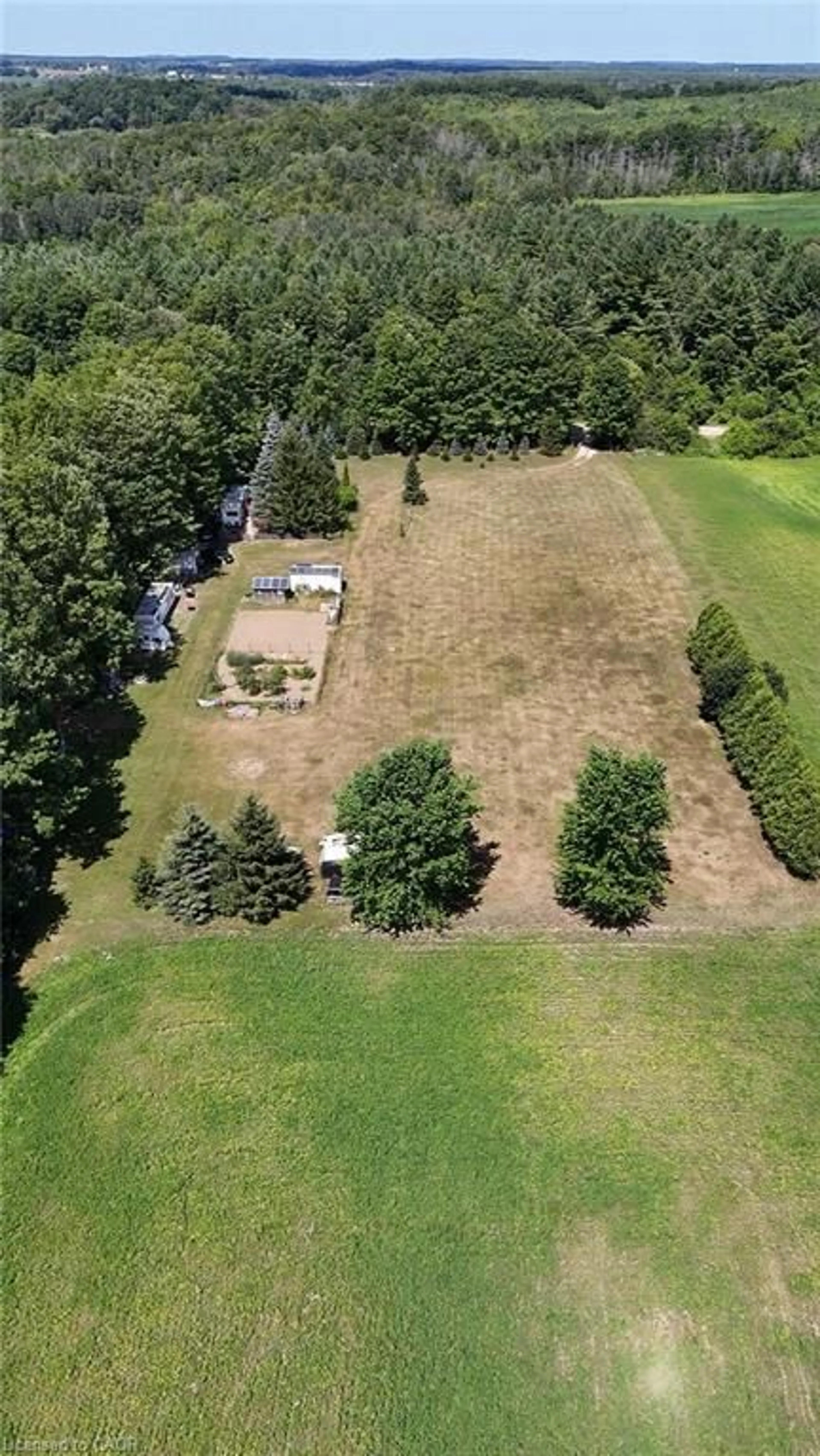 A pic from outside/outdoor area/front of a property/back of a property/a pic from drone, forest/trees view for 80 West St, Wingham Ontario N0G 2W0