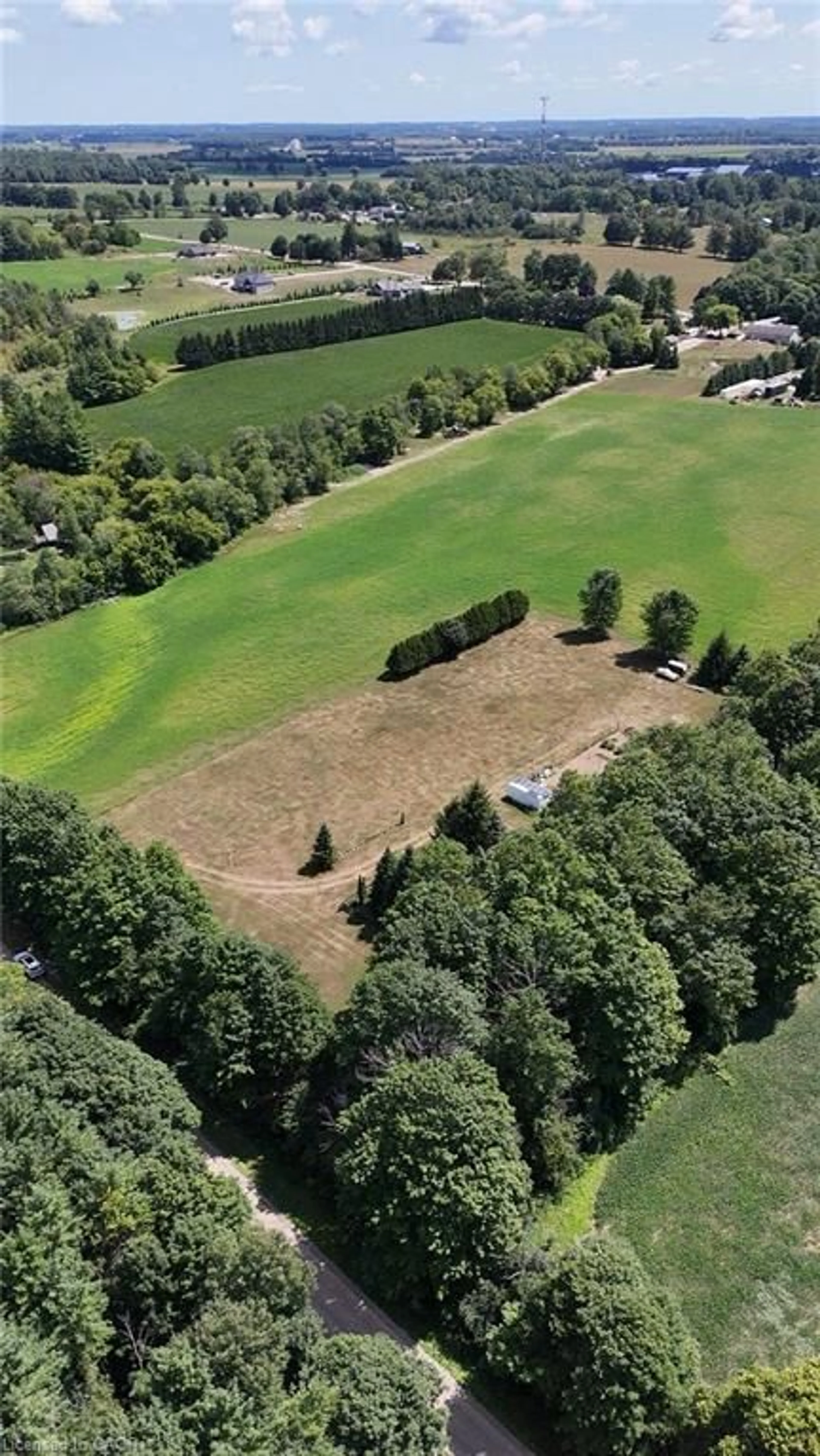 A pic from outside/outdoor area/front of a property/back of a property/a pic from drone, forest/trees view for 80 West St, Wingham Ontario N0G 2W0