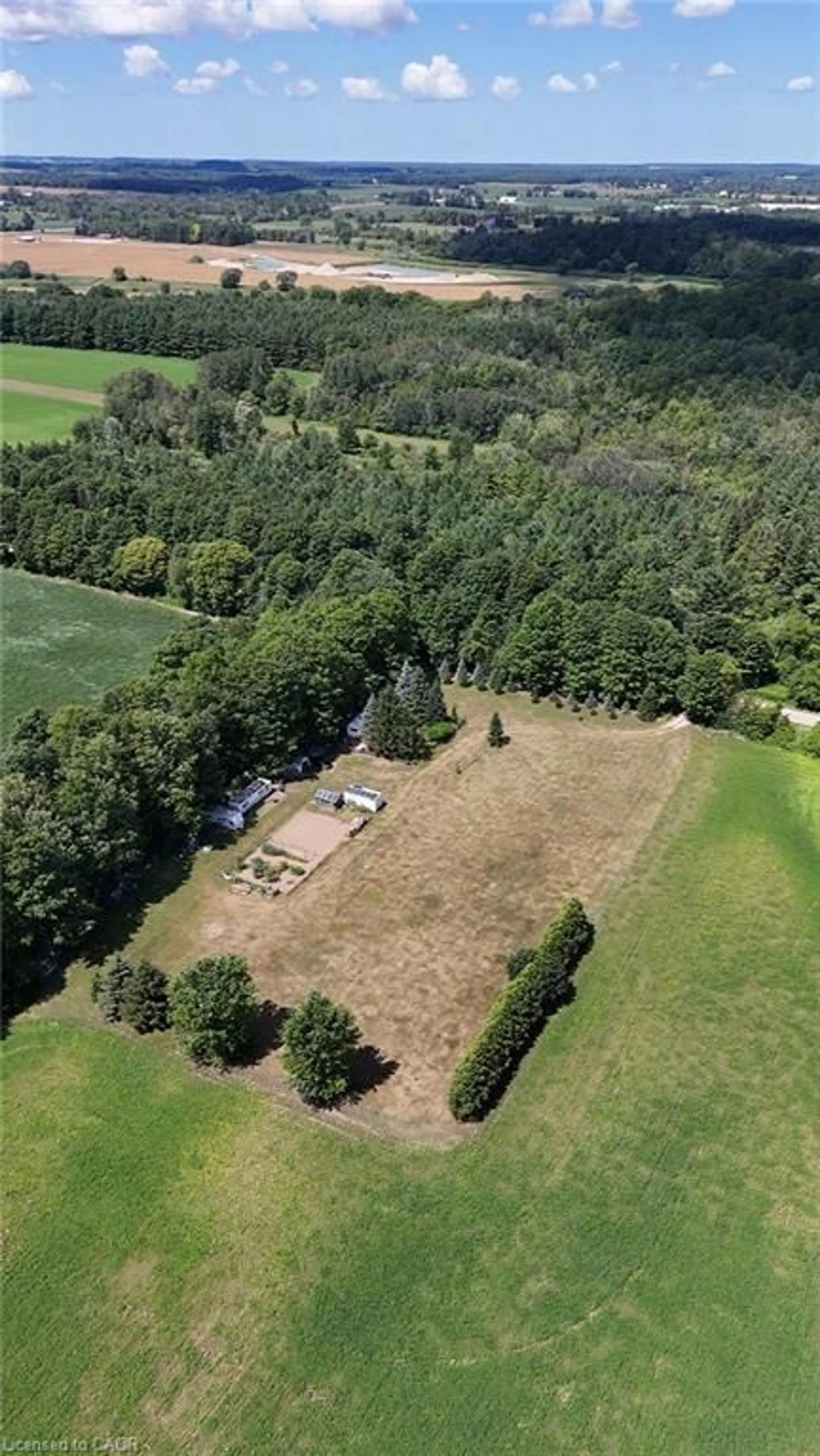 A pic from outside/outdoor area/front of a property/back of a property/a pic from drone, forest/trees view for 80 West St, Wingham Ontario N0G 2W0