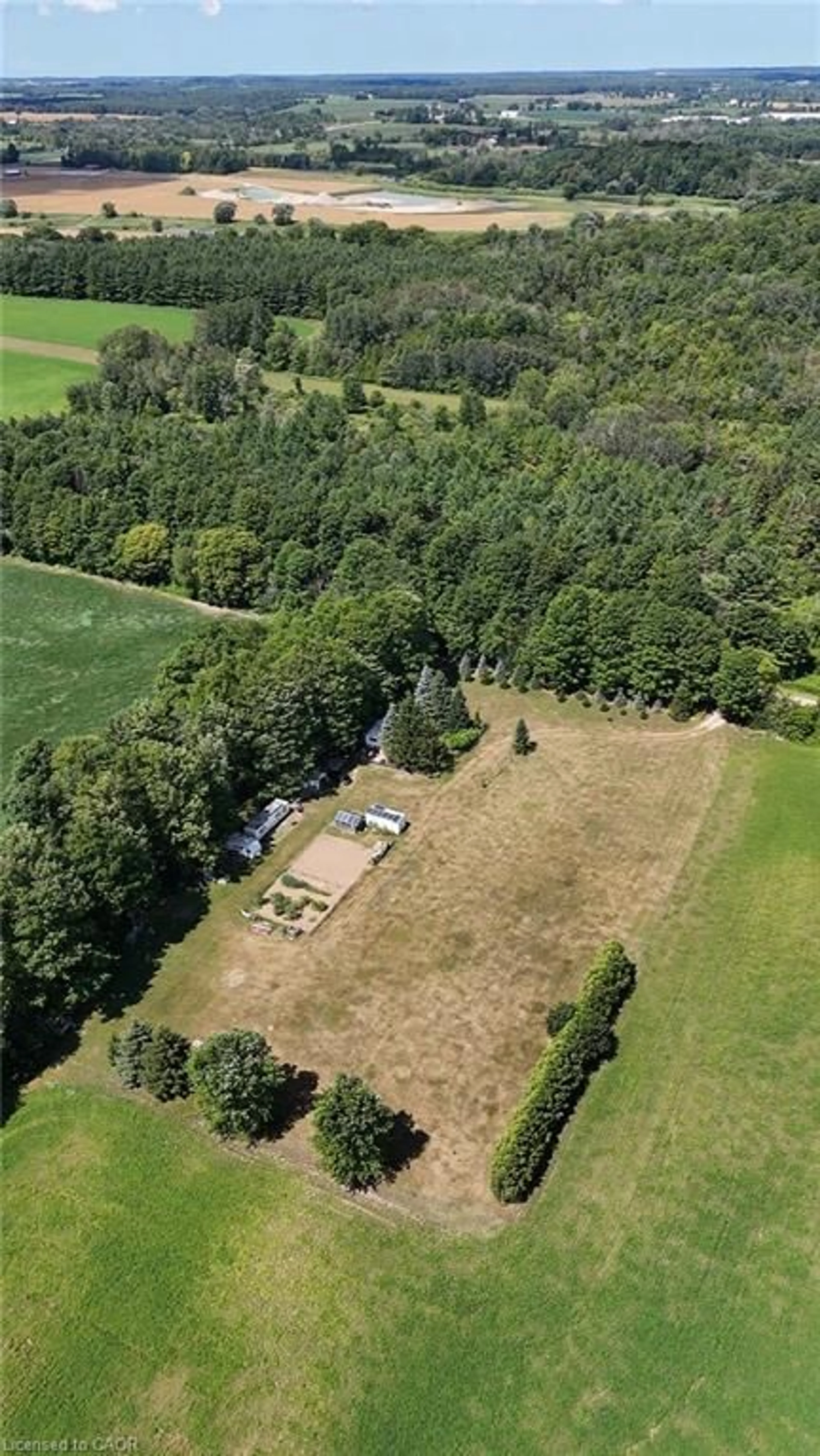 A pic from outside/outdoor area/front of a property/back of a property/a pic from drone, forest/trees view for 80 West St, Wingham Ontario N0G 2W0