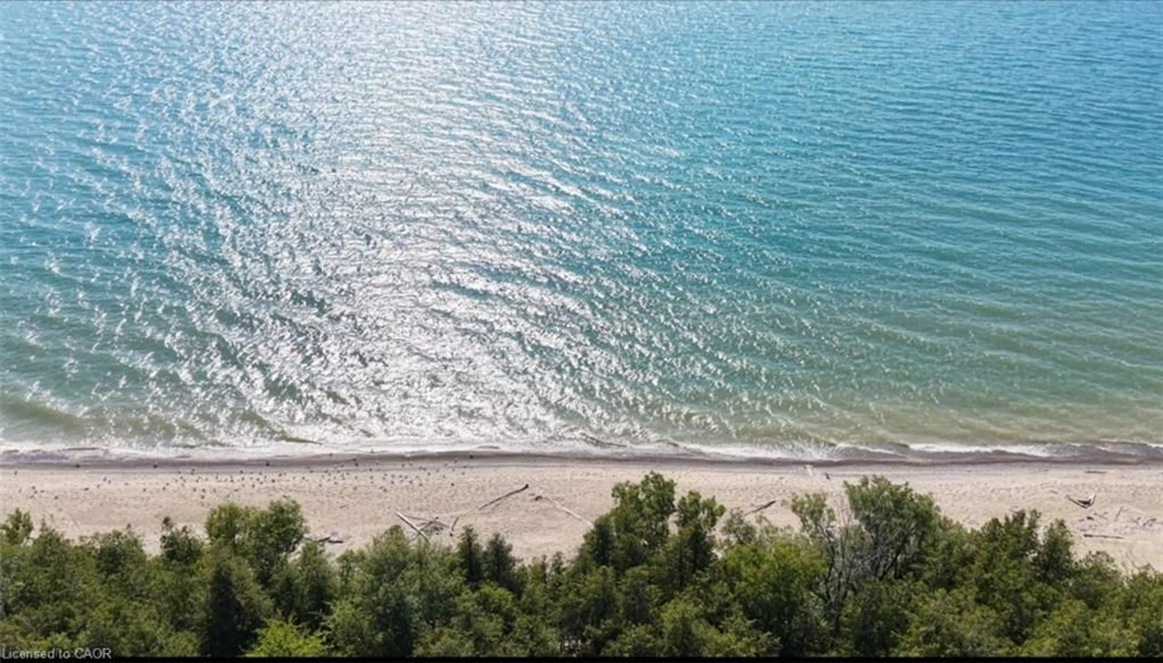 A pic from outside/outdoor area/front of a property/back of a property/a pic from drone, water/lake/river/ocean view for 49 Huron St, Port Albert Ontario N7A 3X9