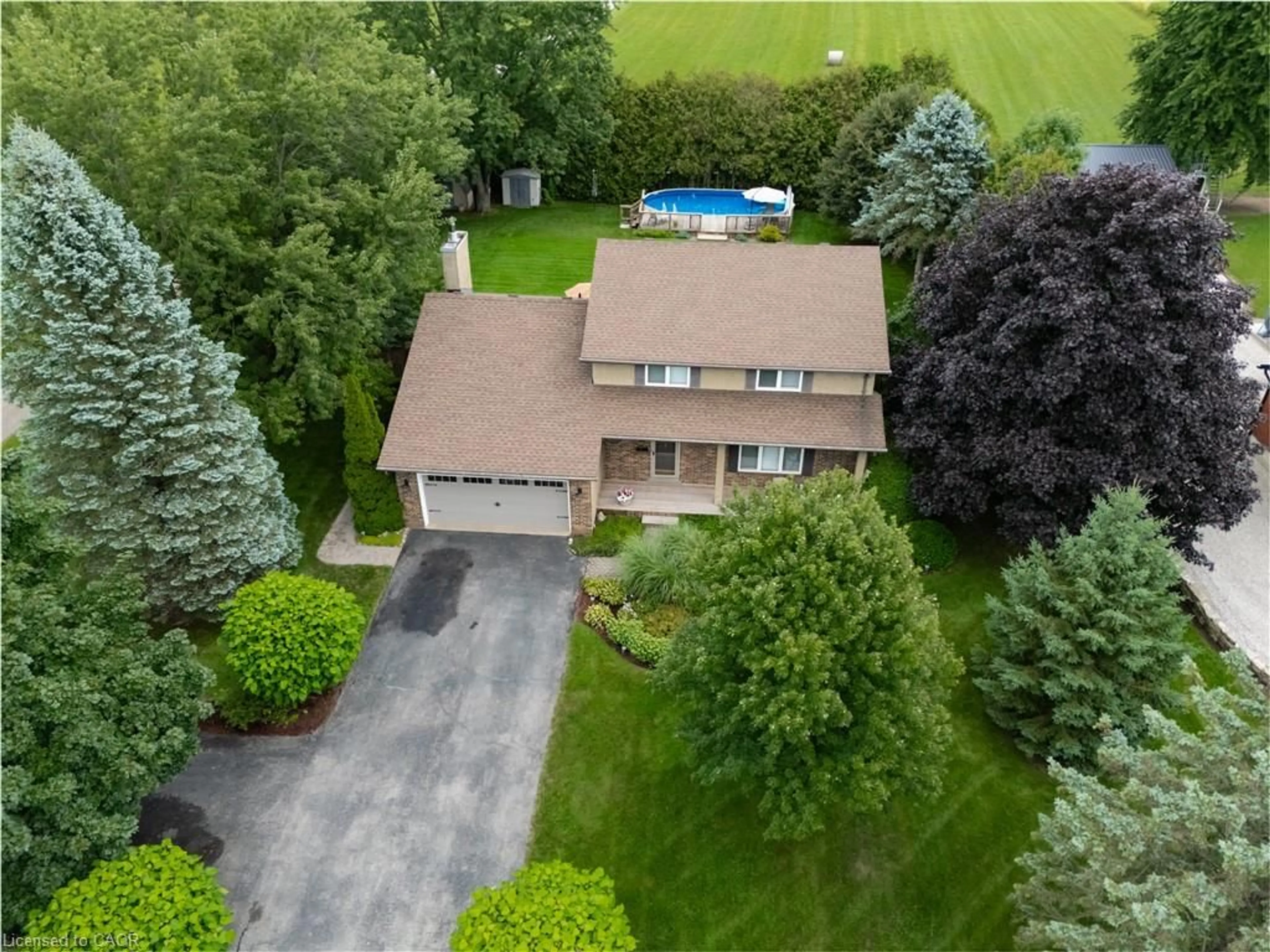 A pic from outside/outdoor area/front of a property/back of a property/a pic from drone, street for 671 Main St, Burgessville Ontario N0J 1C0