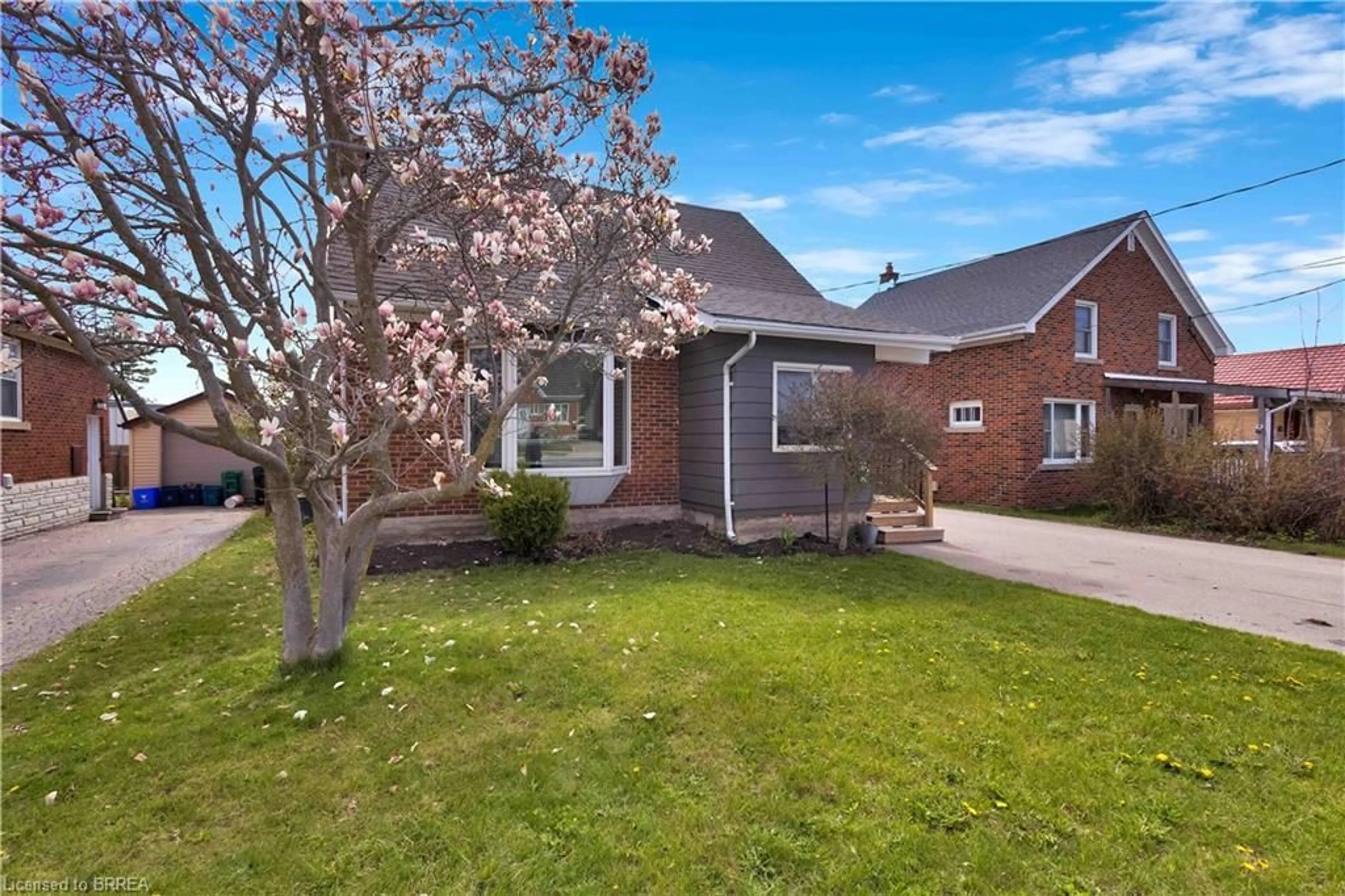 Home with brick exterior material, street for 371 Ottawa St, Kitchener Ontario N2M 3P3