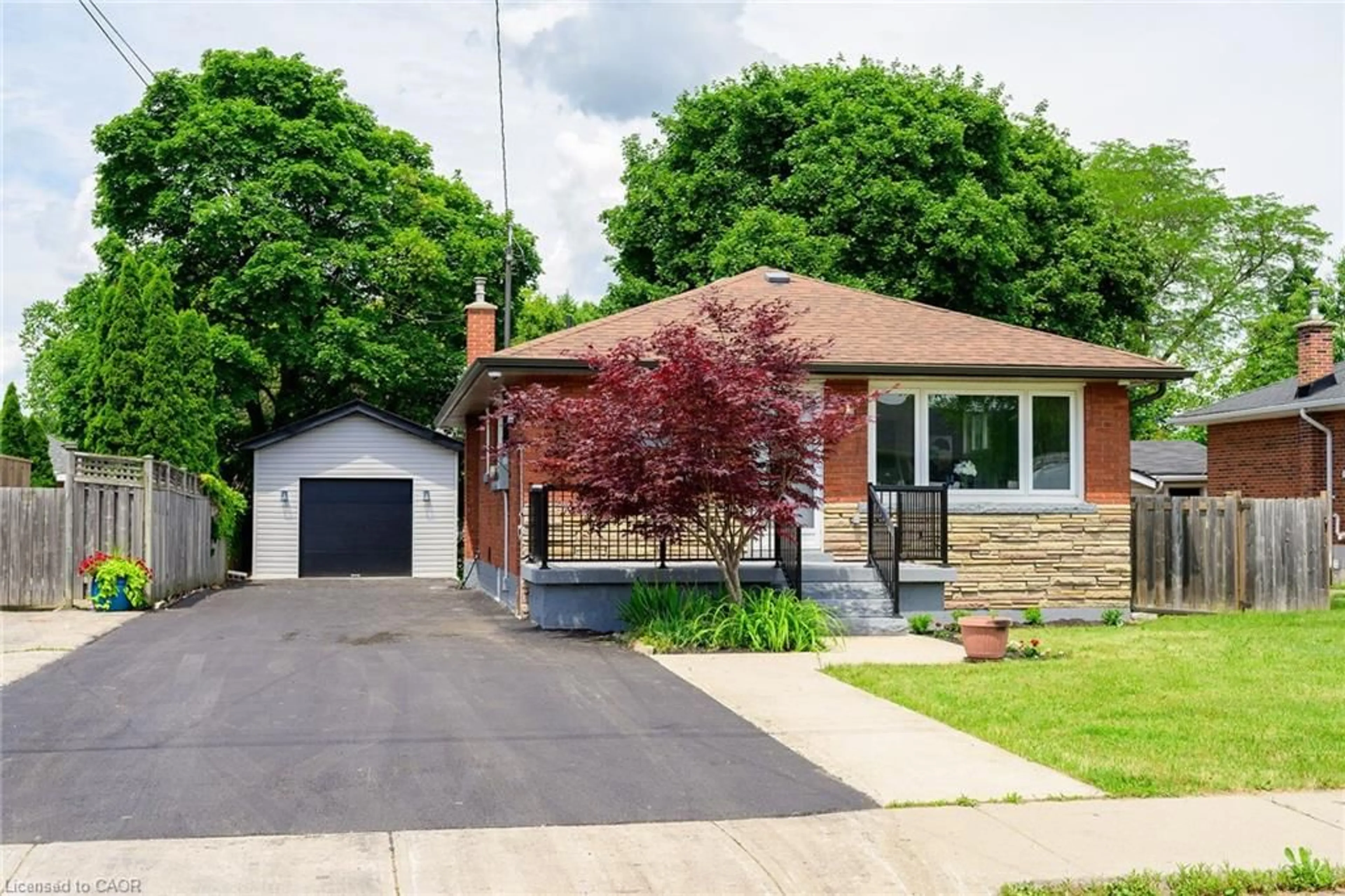 Home with brick exterior material, street for 150 Howard Ave, Hamilton Ontario L9A 2W8