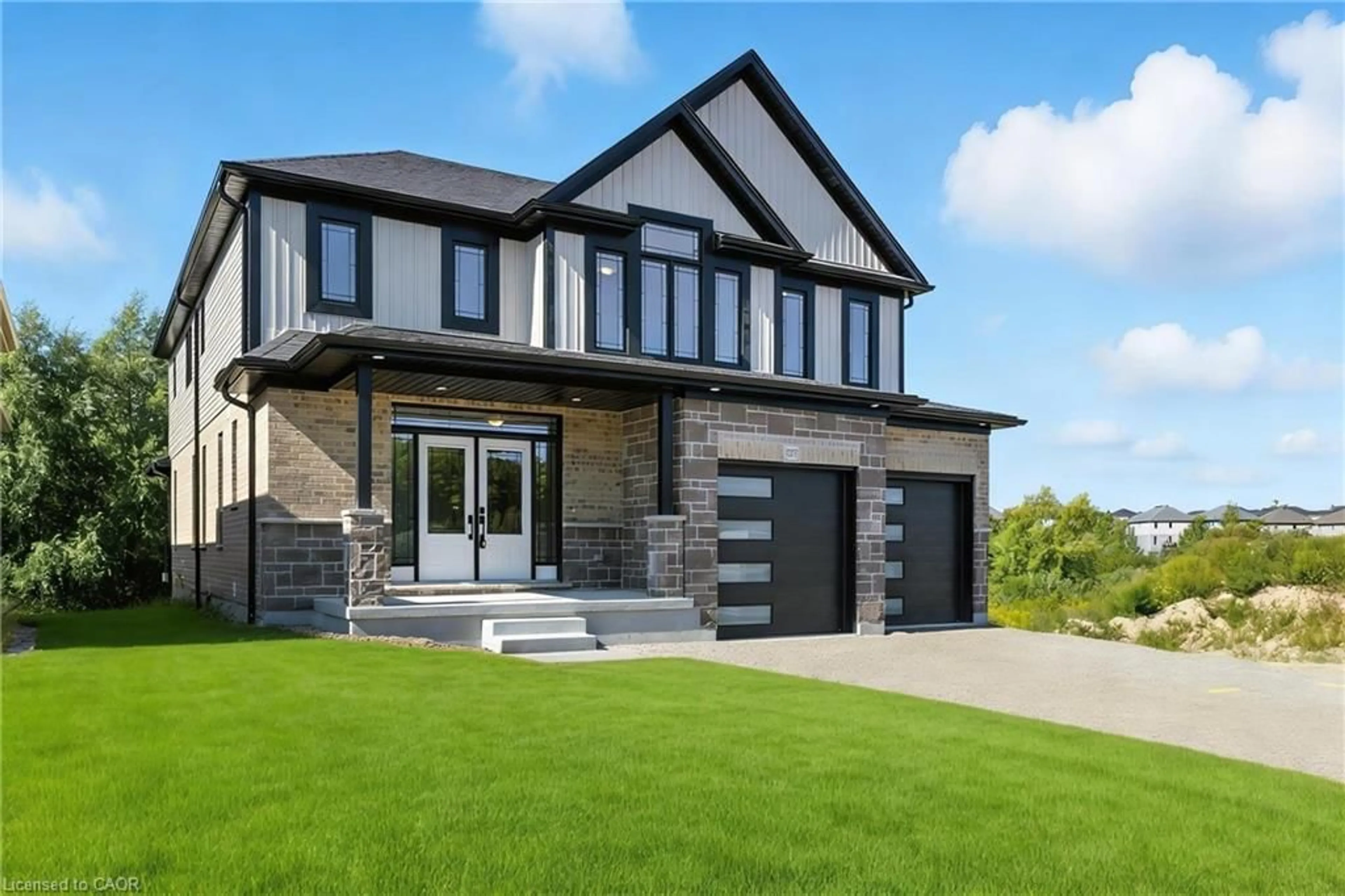 Home with brick exterior material, street for 257 Ladyslipper Dr, Waterloo Ontario N2V 0C3