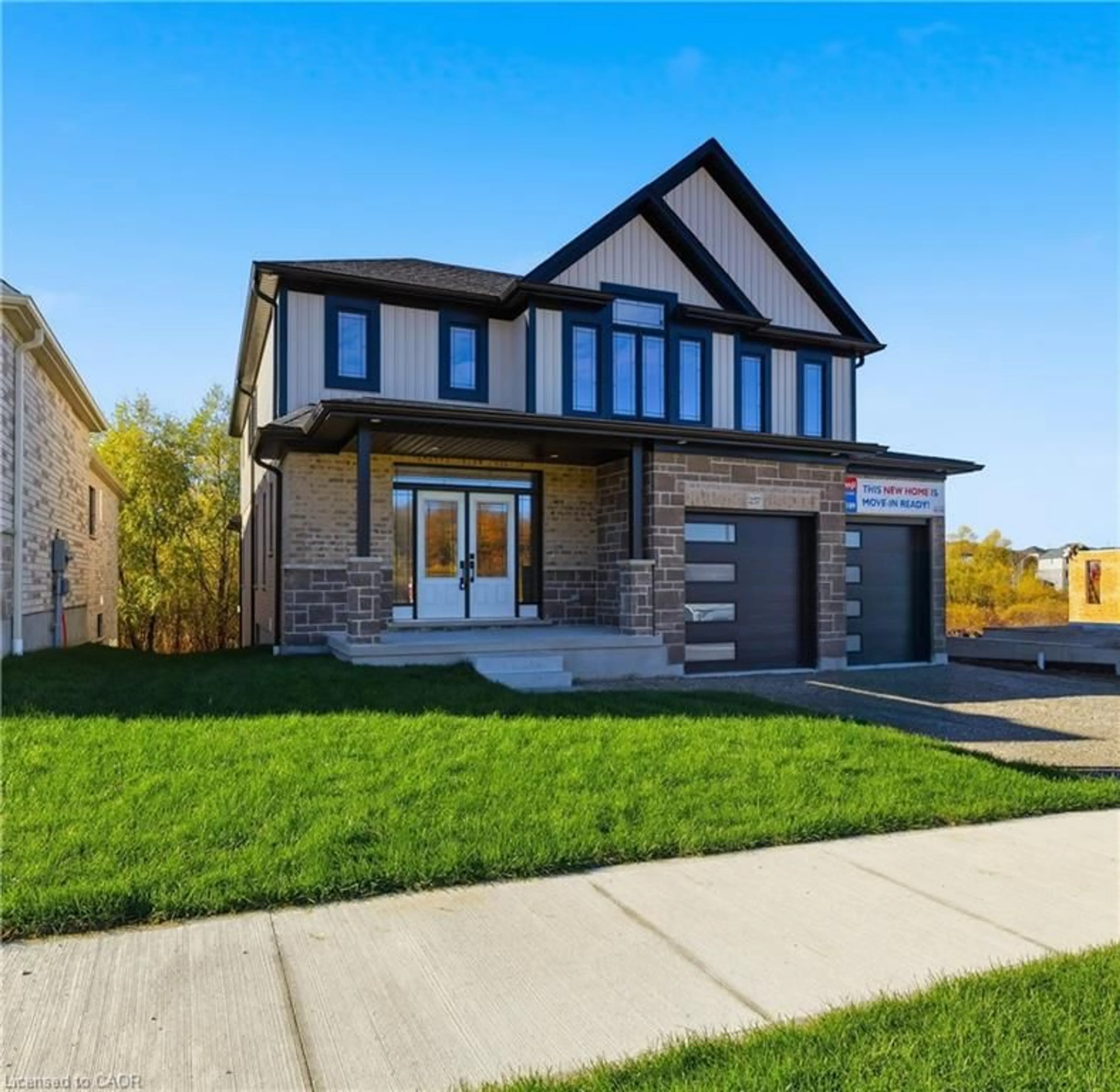 Home with brick exterior material, street for 257 Ladyslipper Dr, Waterloo Ontario N2V 0C3