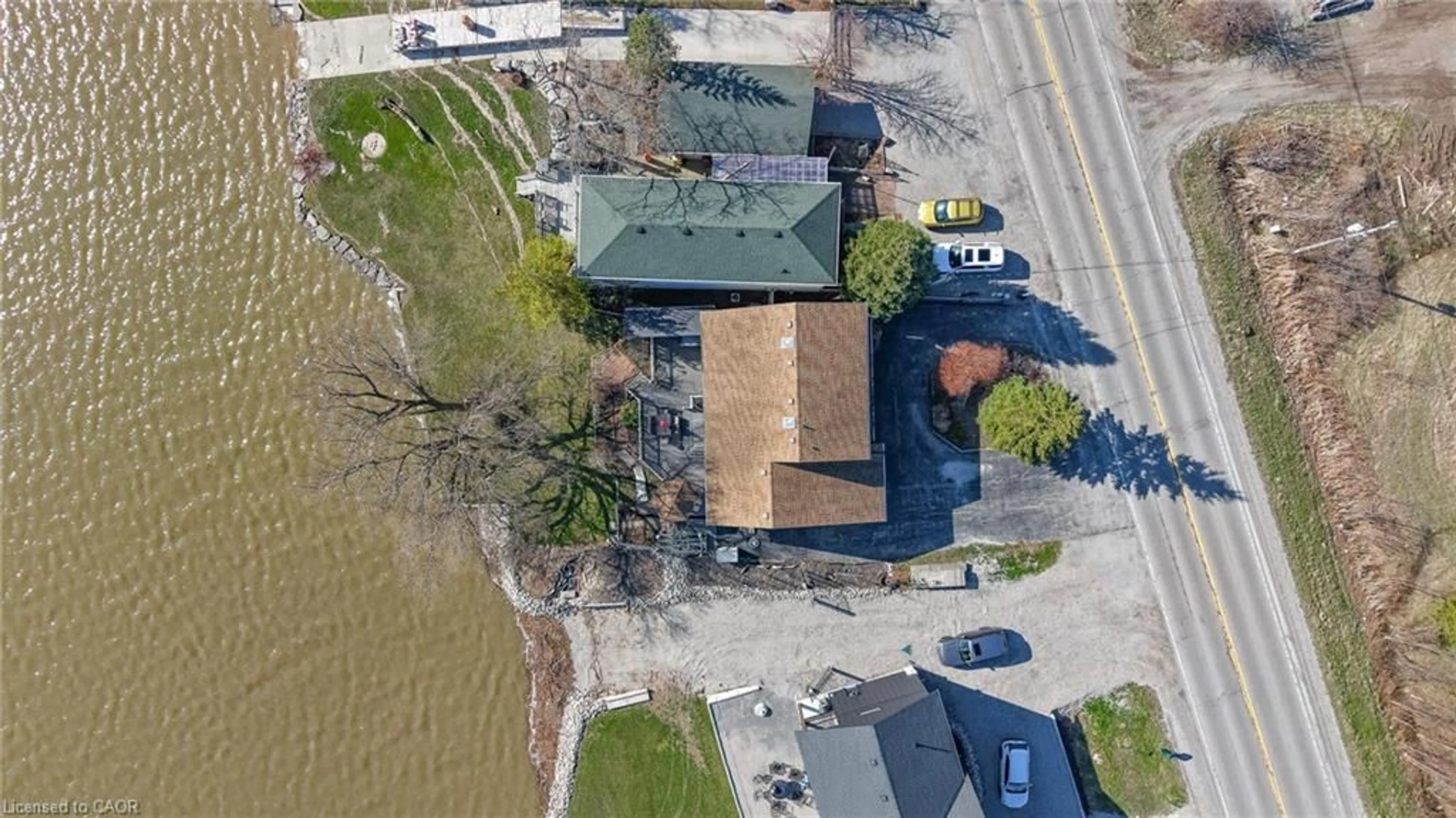 A pic from outside/outdoor area/front of a property/back of a property/a pic from drone, water/lake/river/ocean view for 95 Haldimand Road 17, Dunnville Ontario N1A 2W4