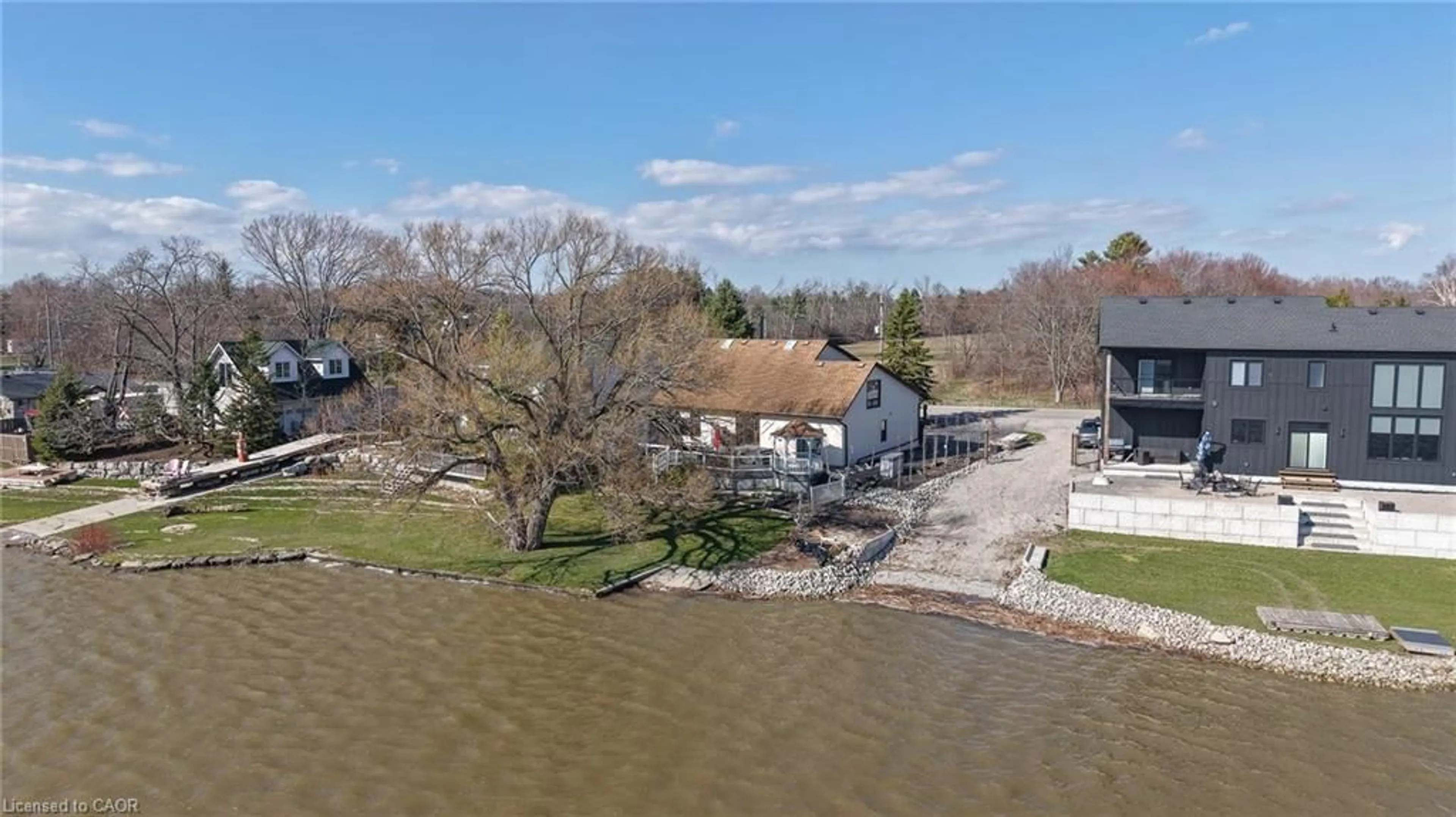 A pic from outside/outdoor area/front of a property/back of a property/a pic from drone, water/lake/river/ocean view for 95 Haldimand Road 17, Dunnville Ontario N1A 2W4