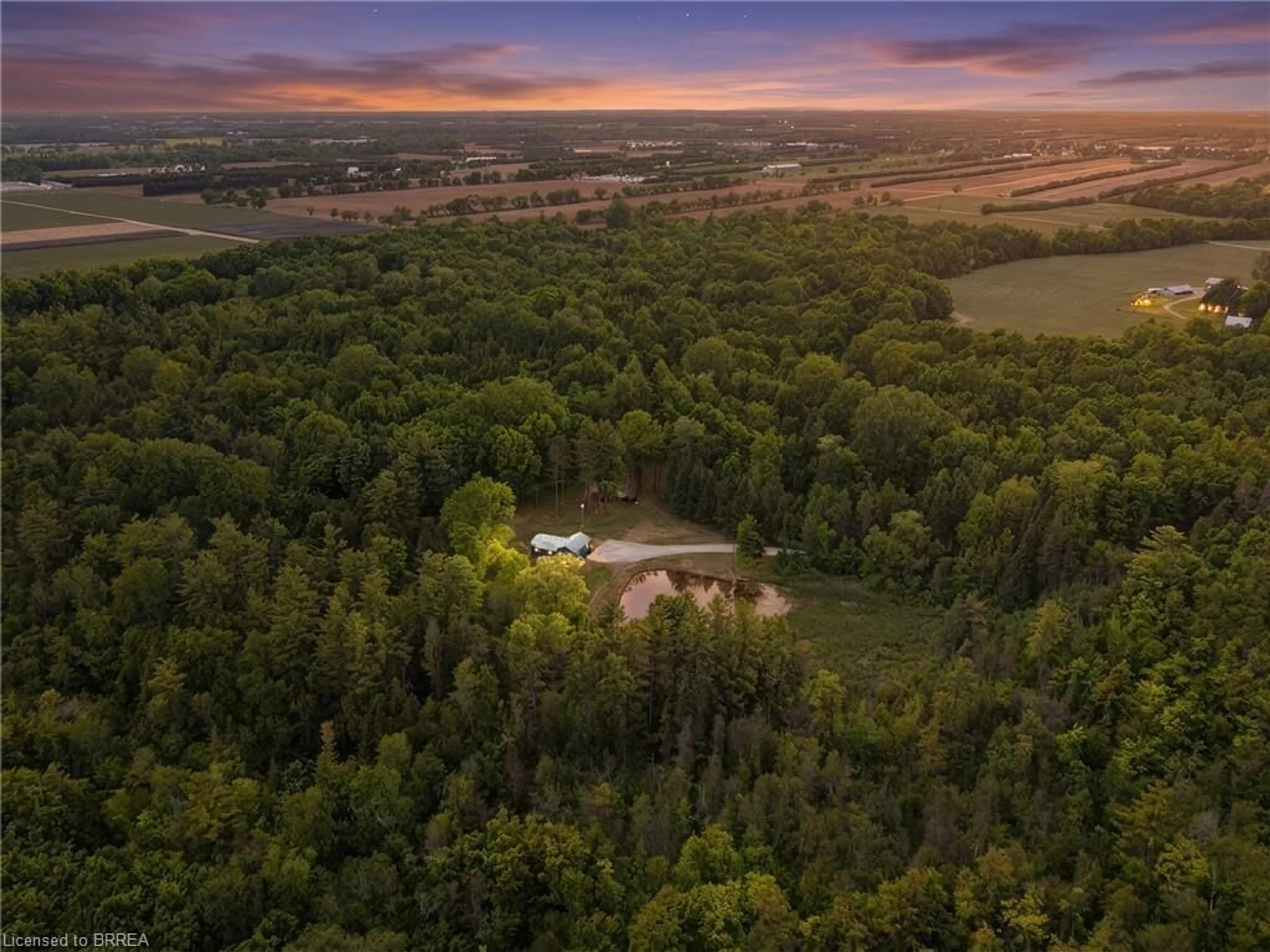 A pic from outside/outdoor area/front of a property/back of a property/a pic from drone, forest/trees view for 1521 Windham Road 19, Norfolk County Ontario N0E 1H0