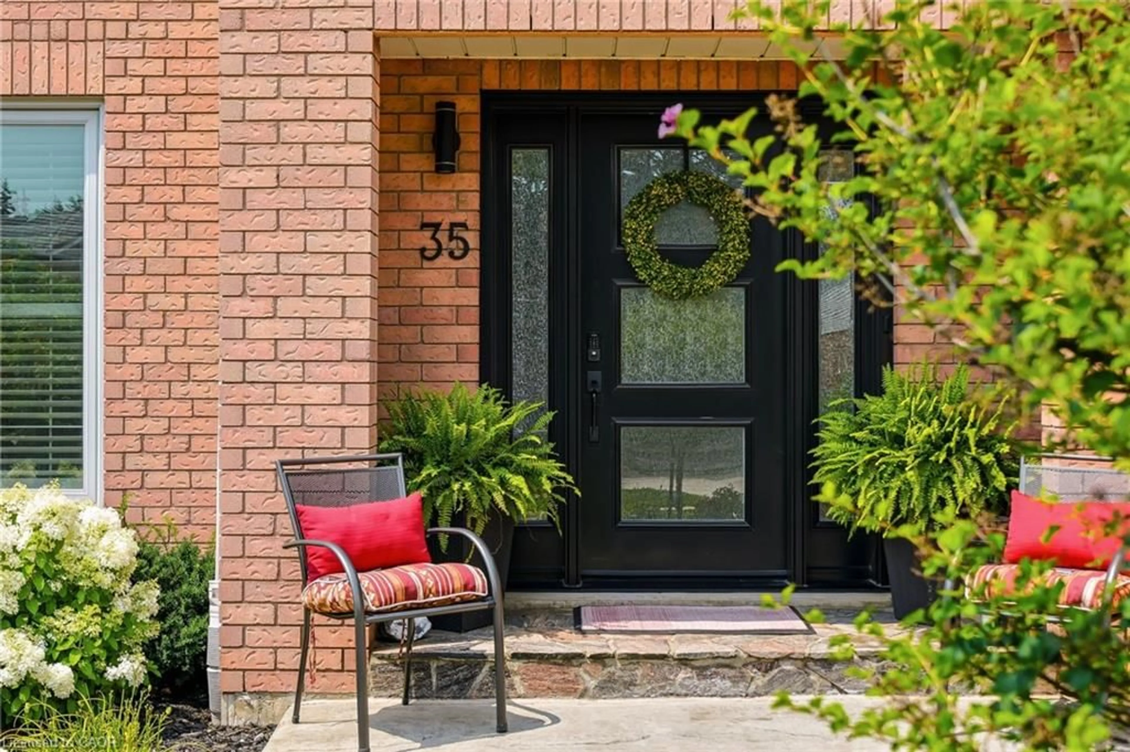 Home with brick exterior material, street for 35 Culotta Dr, Waterdown Ontario L8B 0G9