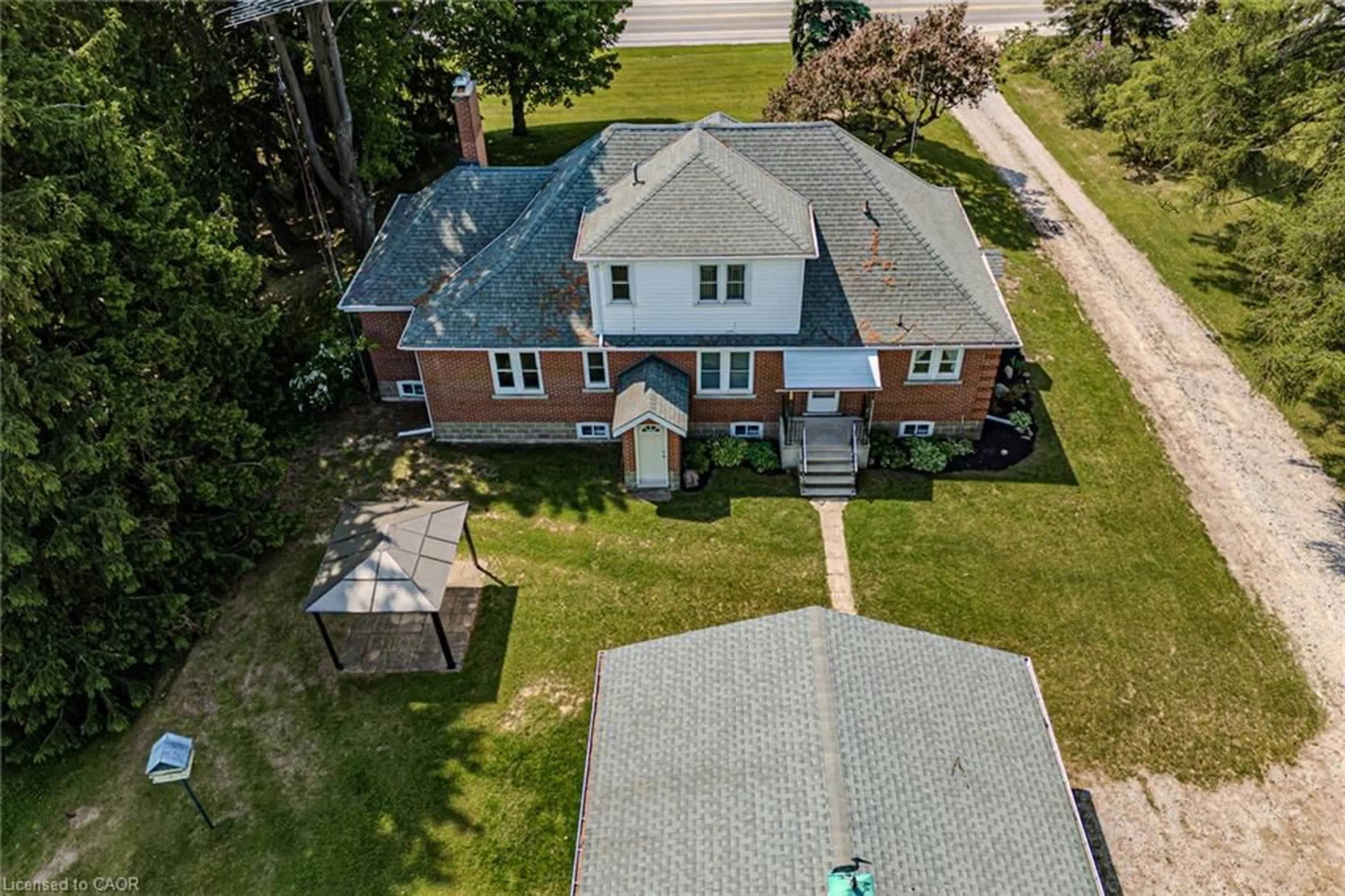 A pic from outside/outdoor area/front of a property/back of a property/a pic from drone, street for 573 Highway 6, Port Dover Ontario N0A 1N2