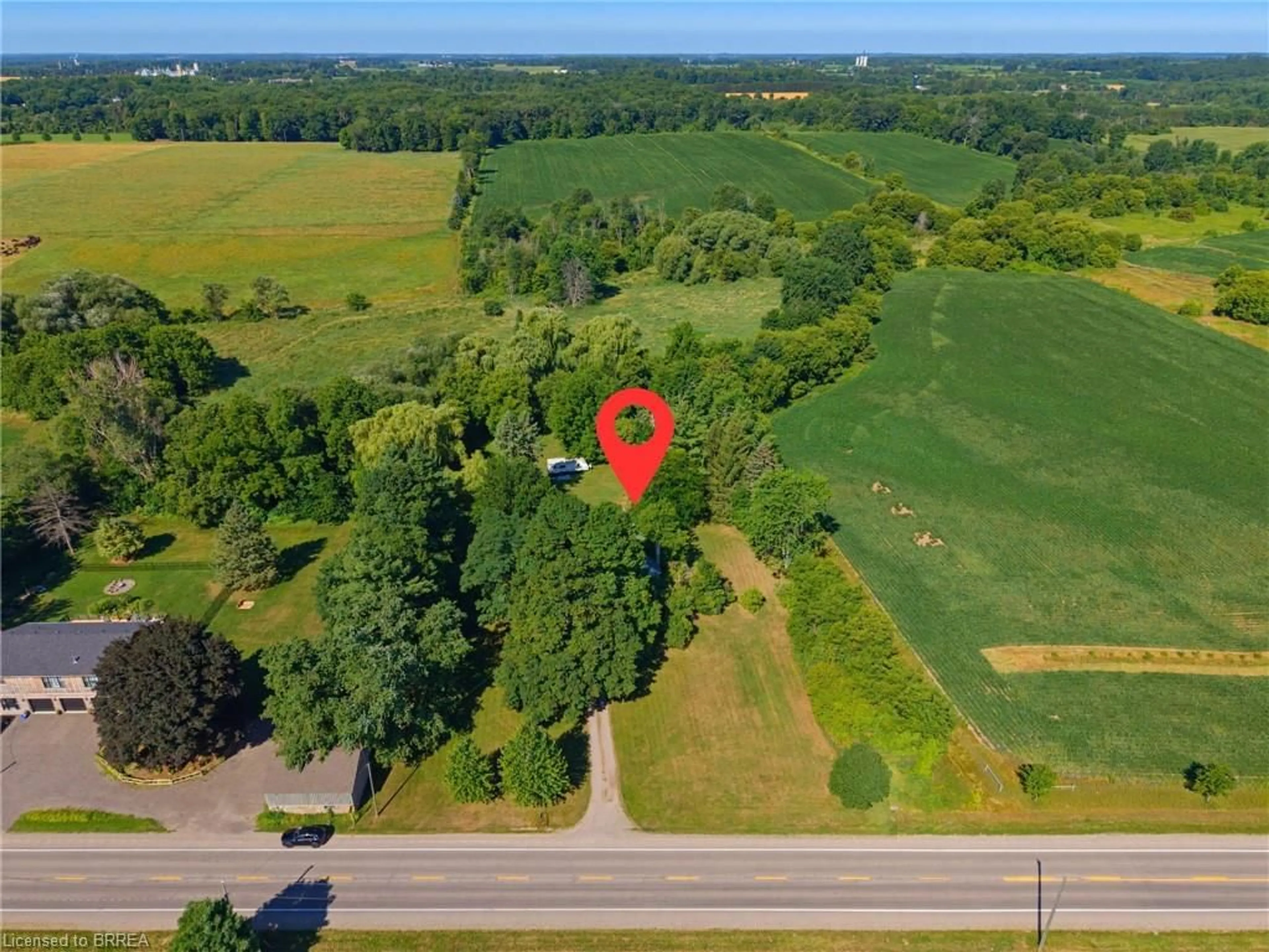 A pic from outside/outdoor area/front of a property/back of a property/a pic from drone, unknown for 321 Pinehurst Rd, Paris Ontario N3L 3E2