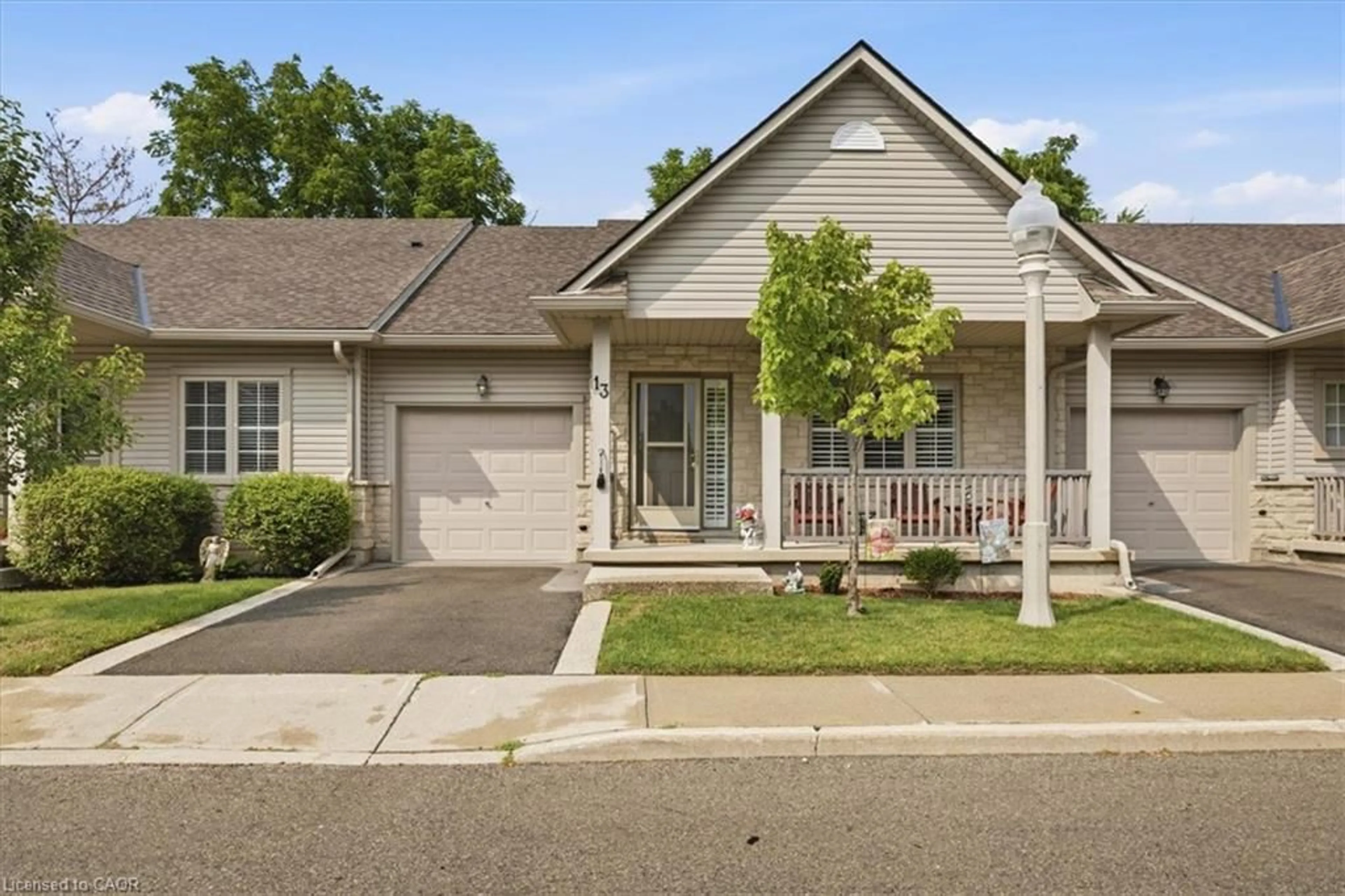 Home with vinyl exterior material, street for 34 Southbrook Dr #13, Binbrook Ontario L0R 1C0
