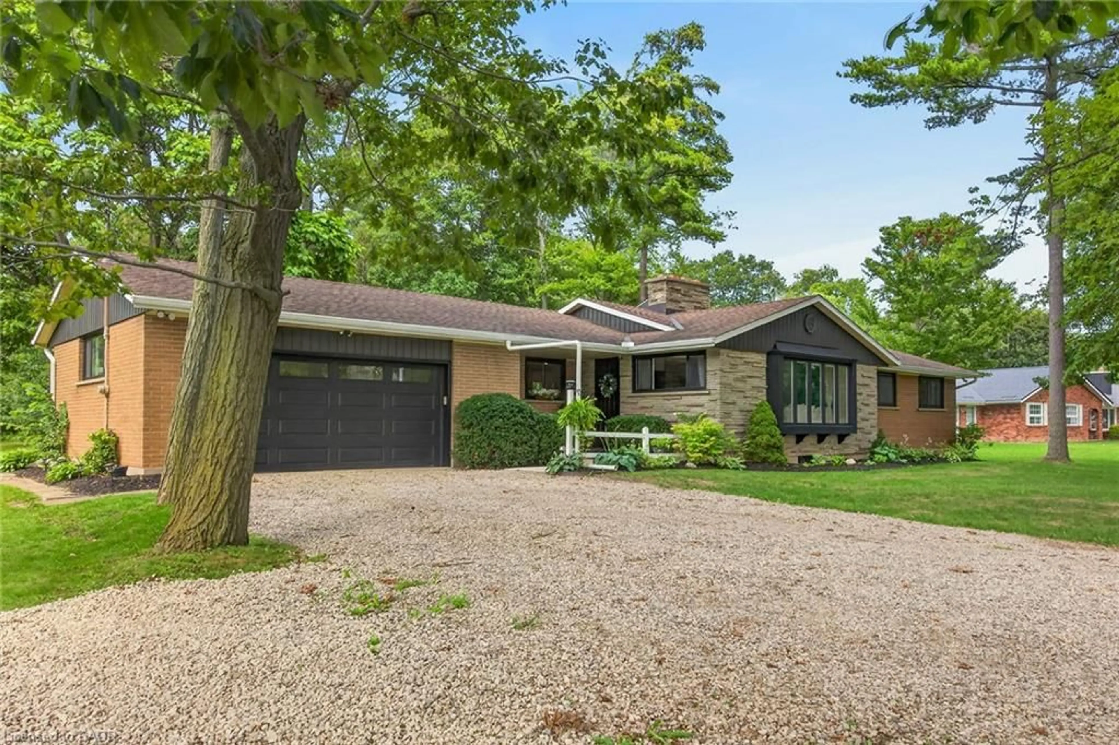 Home with brick exterior material, street for 7079 Rainham Rd, Dunnville Ontario N1A 2W8