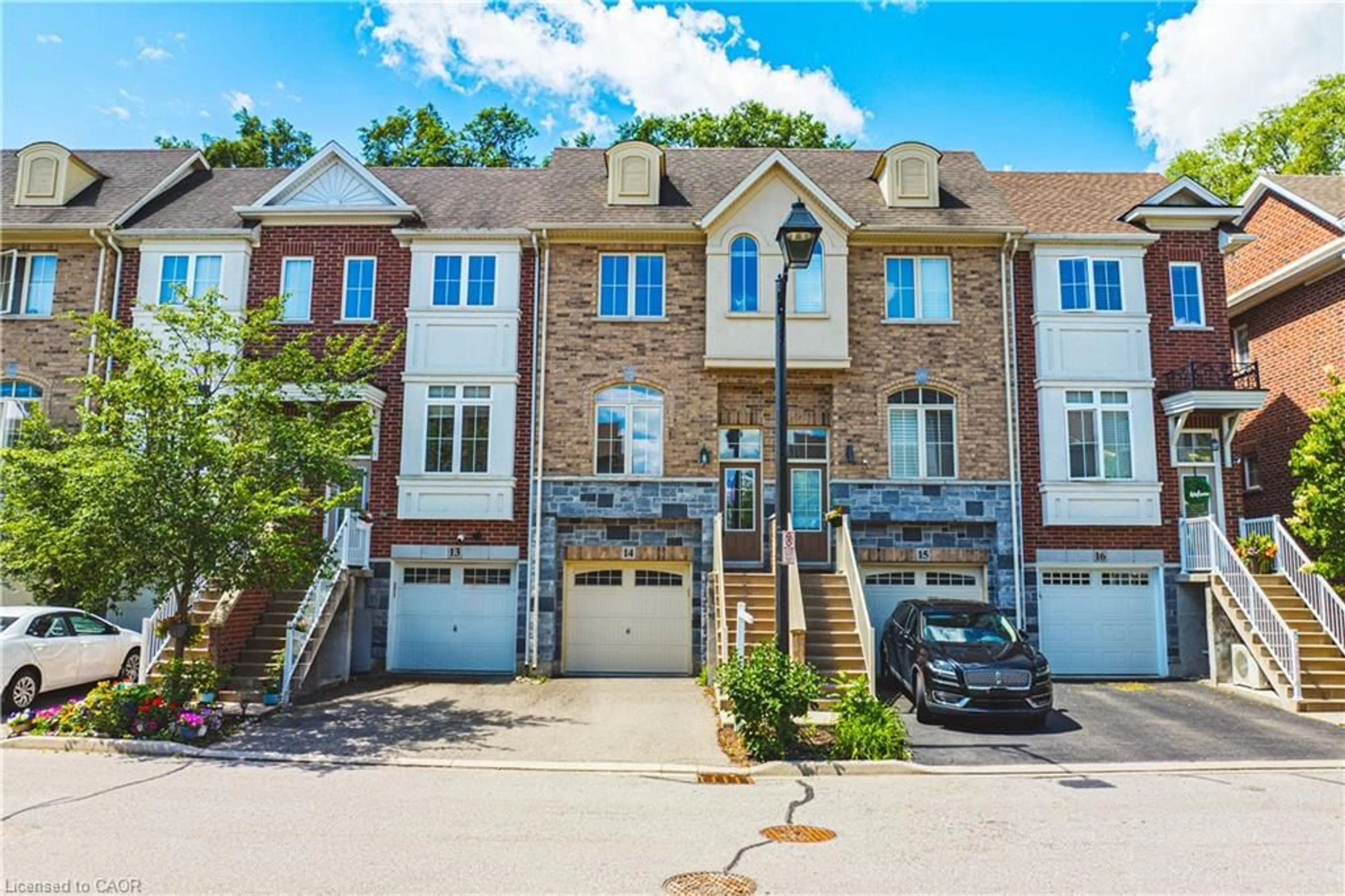 A pic from outside/outdoor area/front of a property/back of a property/a pic from drone, street for 181 Plains Rd #14, Burlington Ontario L7T 0B1