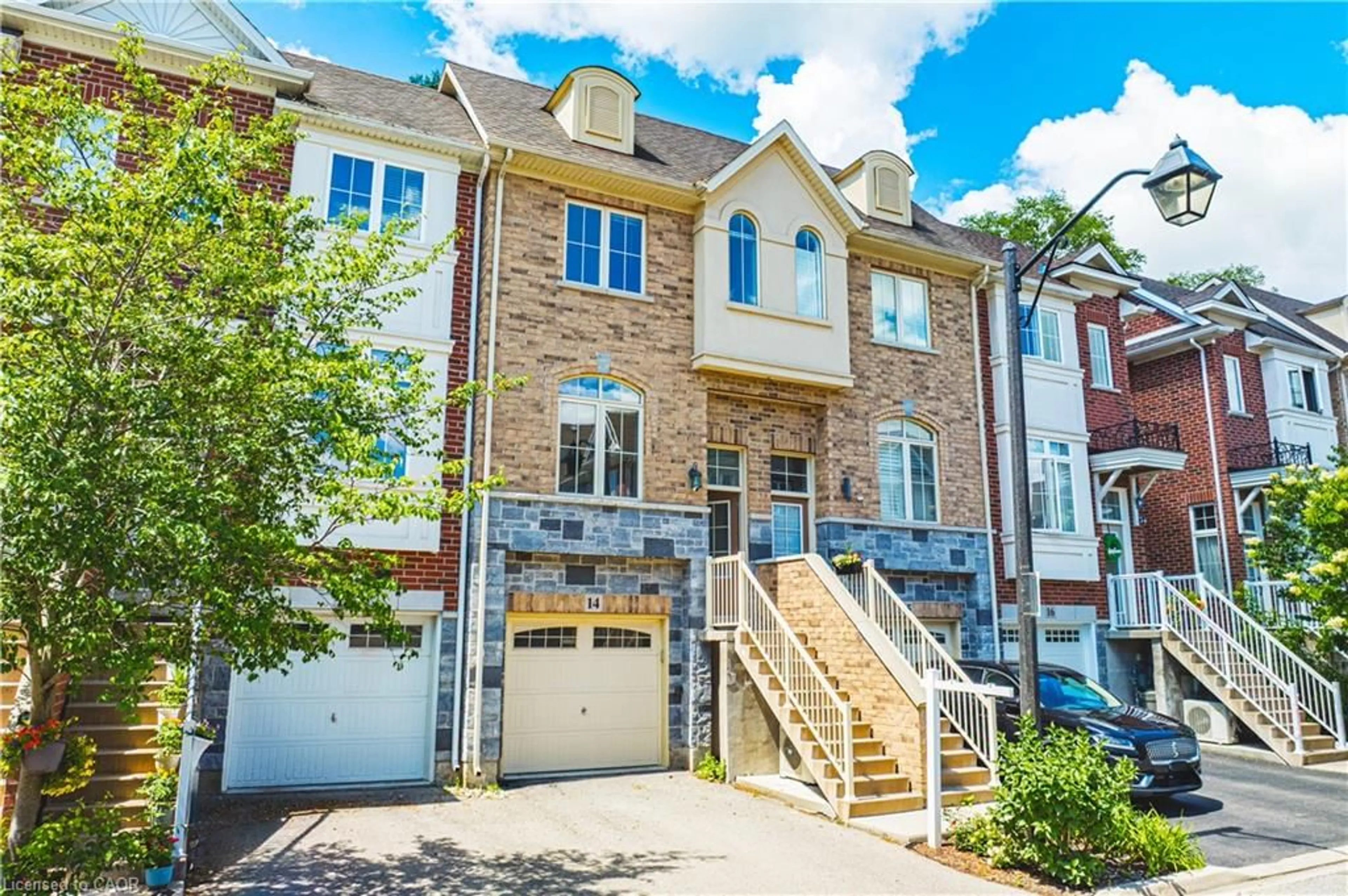 Home with brick exterior material, street for 181 Plains Rd #14, Burlington Ontario L7T 0B1