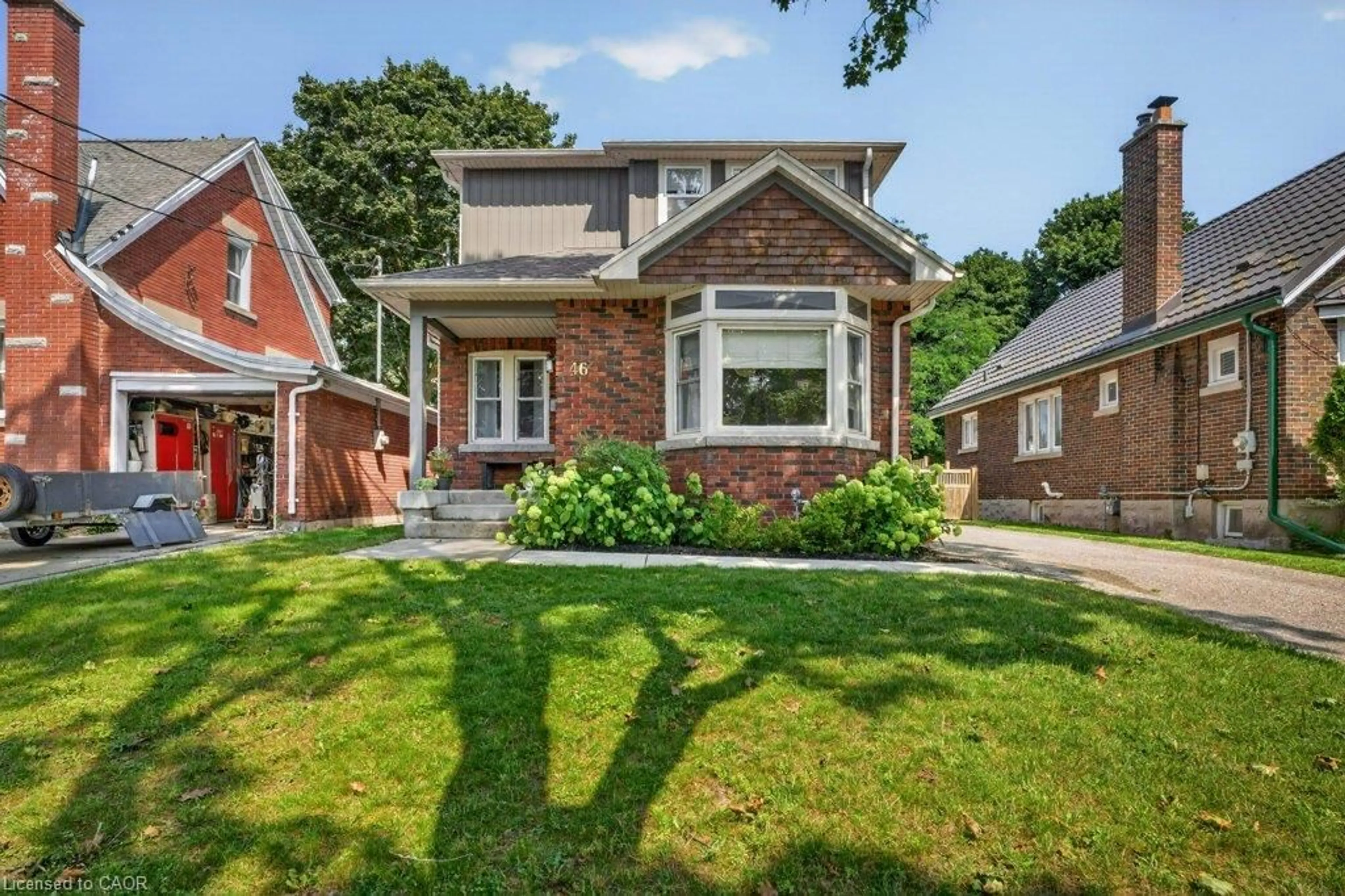Home with brick exterior material, street for 46 Filbert St, Kitchener Ontario N2H 1Y2