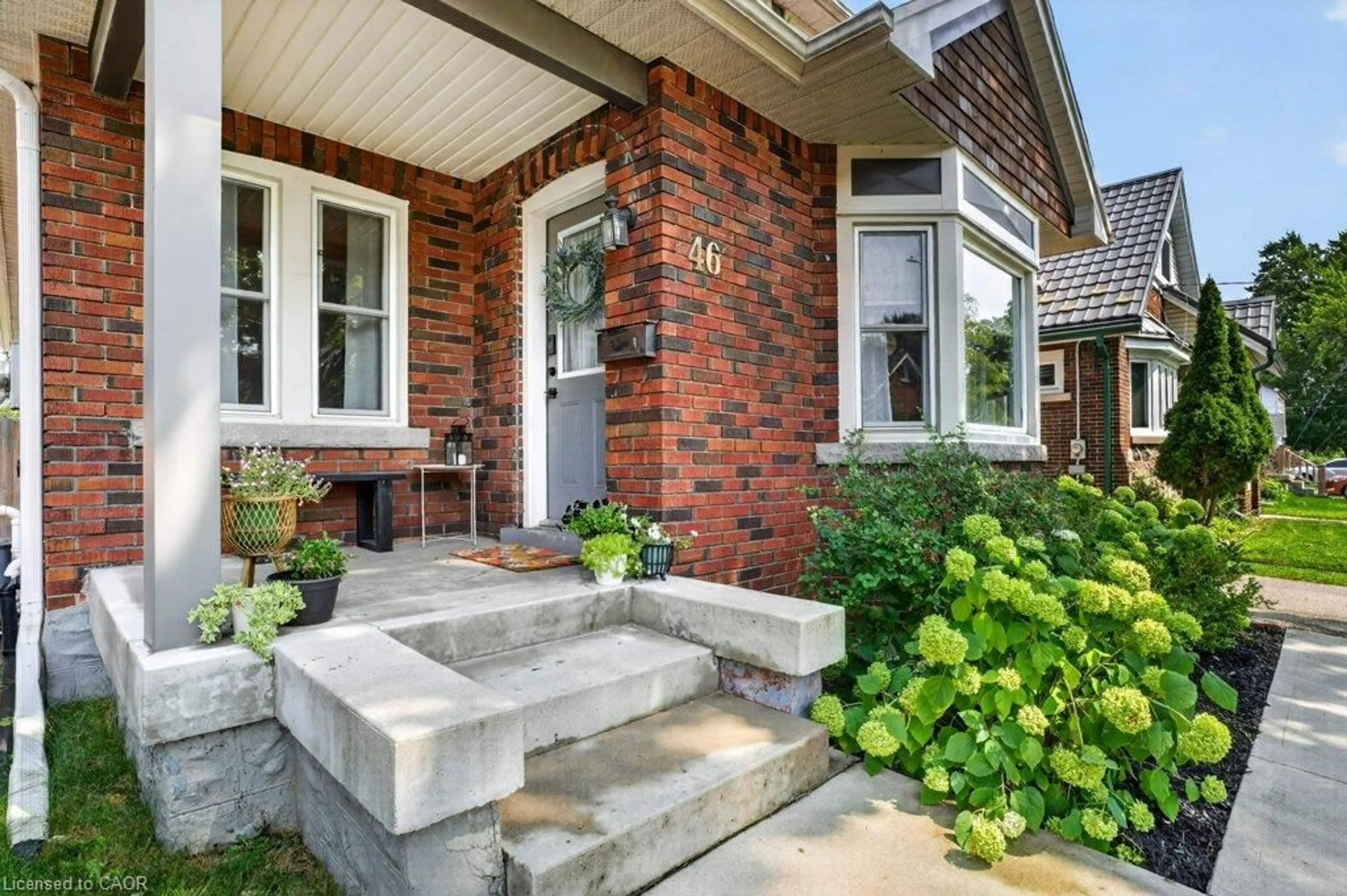 Home with brick exterior material, street for 46 Filbert St, Kitchener Ontario N2H 1Y2