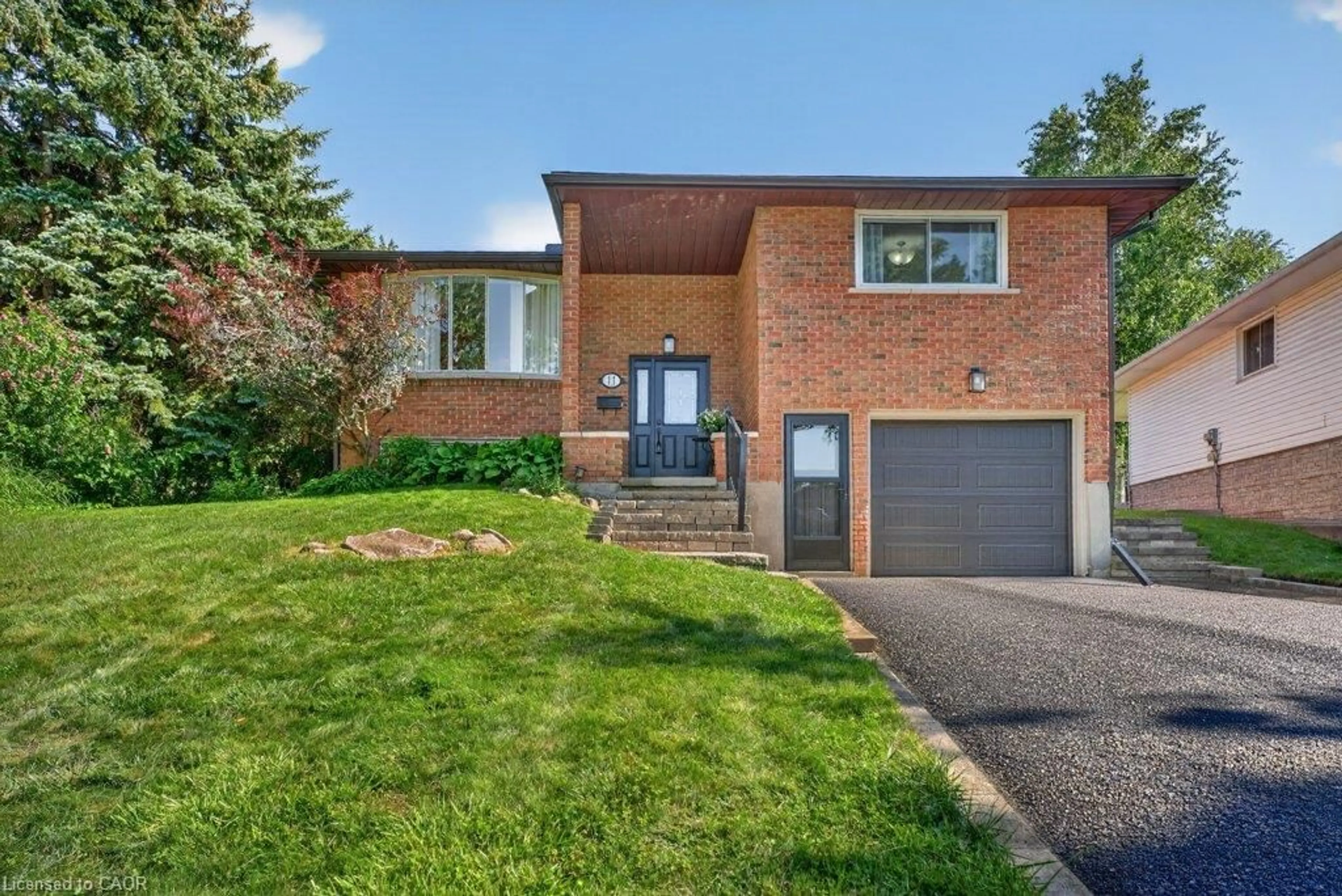 Home with brick exterior material, street for 11 Graywood Crt, Kitchener Ontario N2E 1W2