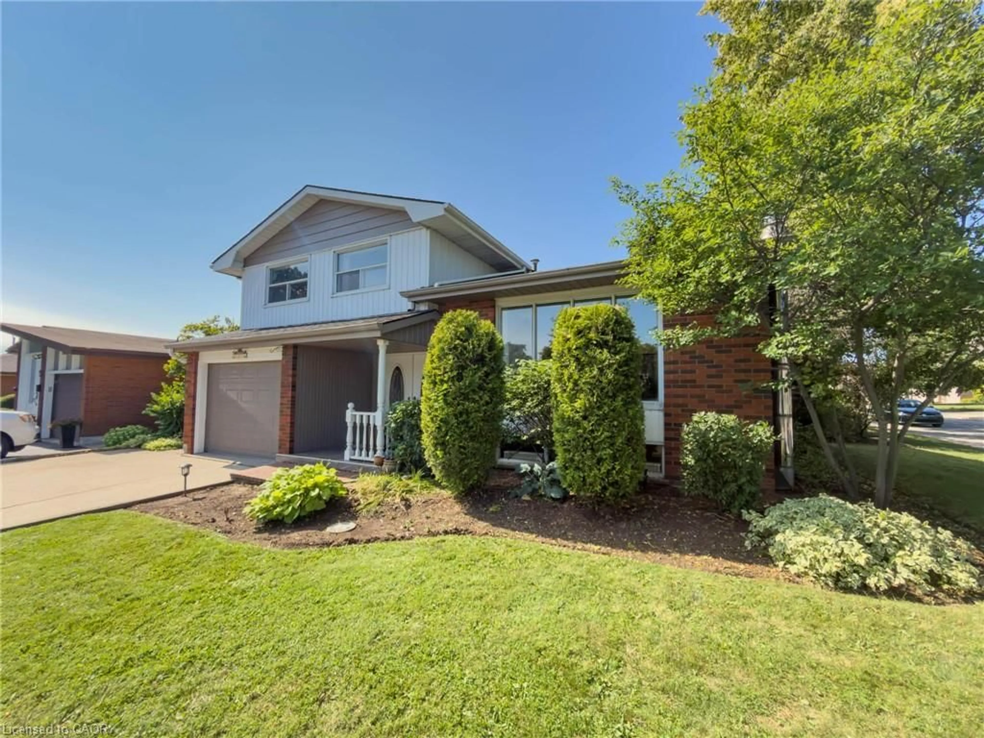 Home with brick exterior material, street for 143 Cromwell Cres, Hamilton Ontario L8G 2G3