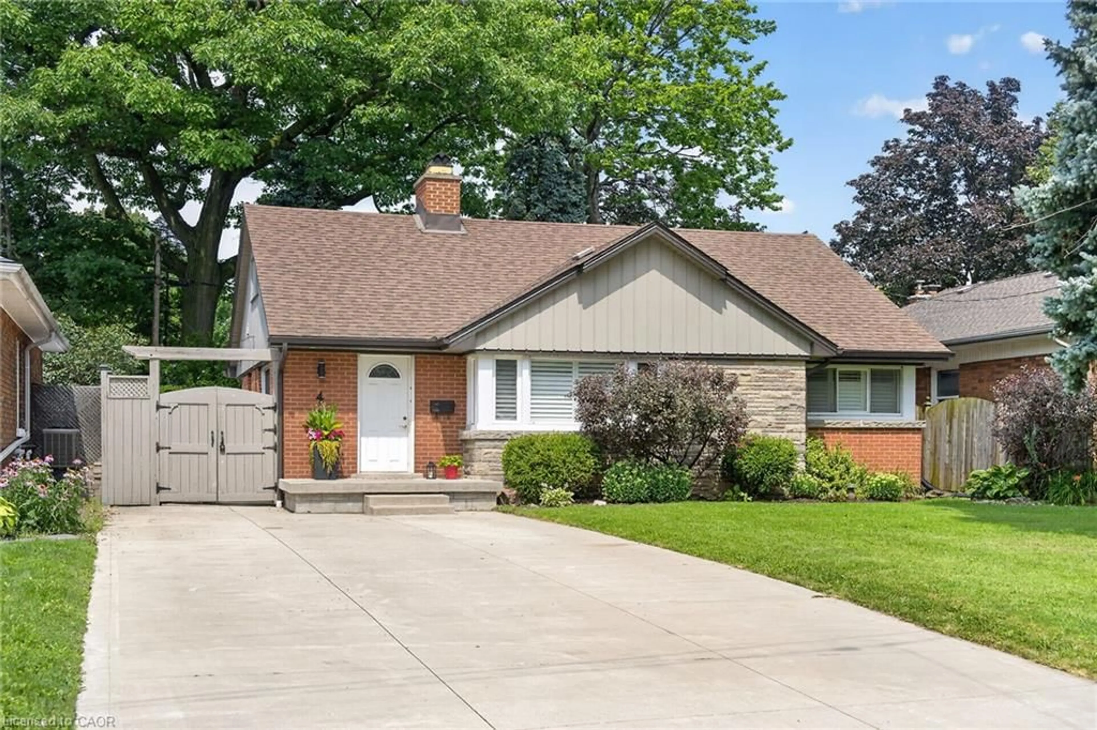 Home with brick exterior material, street for 4 Compton Pl, Hamilton Ontario L8T 3Y1