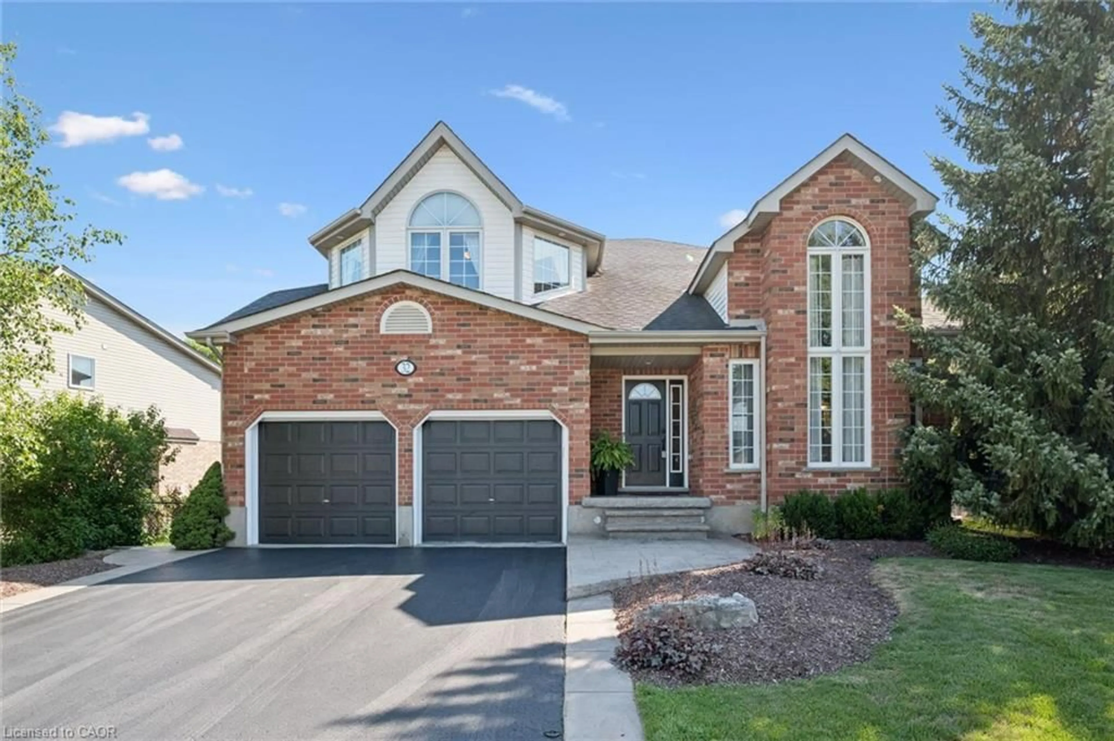Home with brick exterior material, street for 32 Pine Ridge Dr, Guelph Ontario N1L 1K3