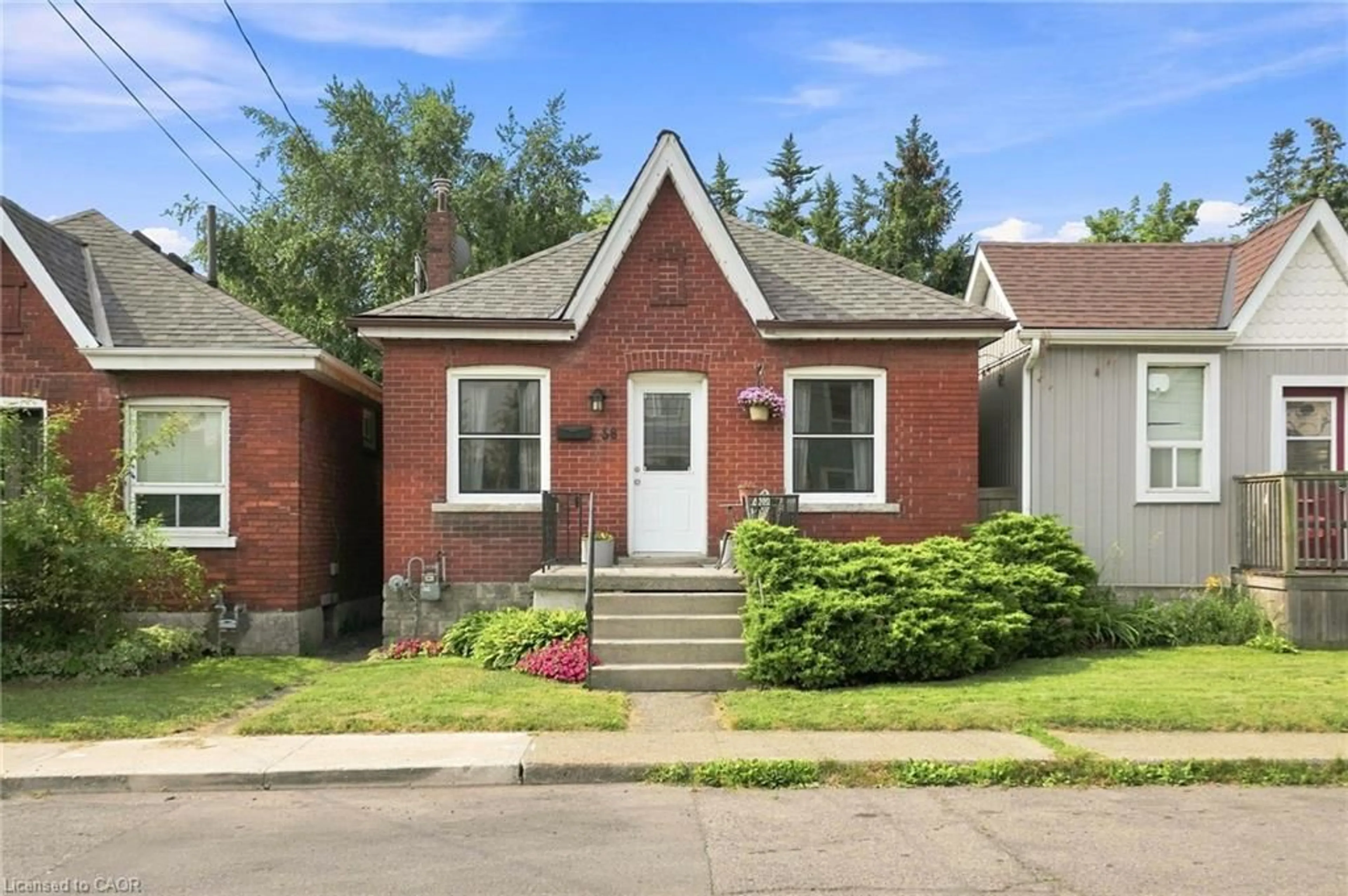 Home with brick exterior material, street for 58 Edinburgh Ave, Hamilton Ontario L8H 2C5
