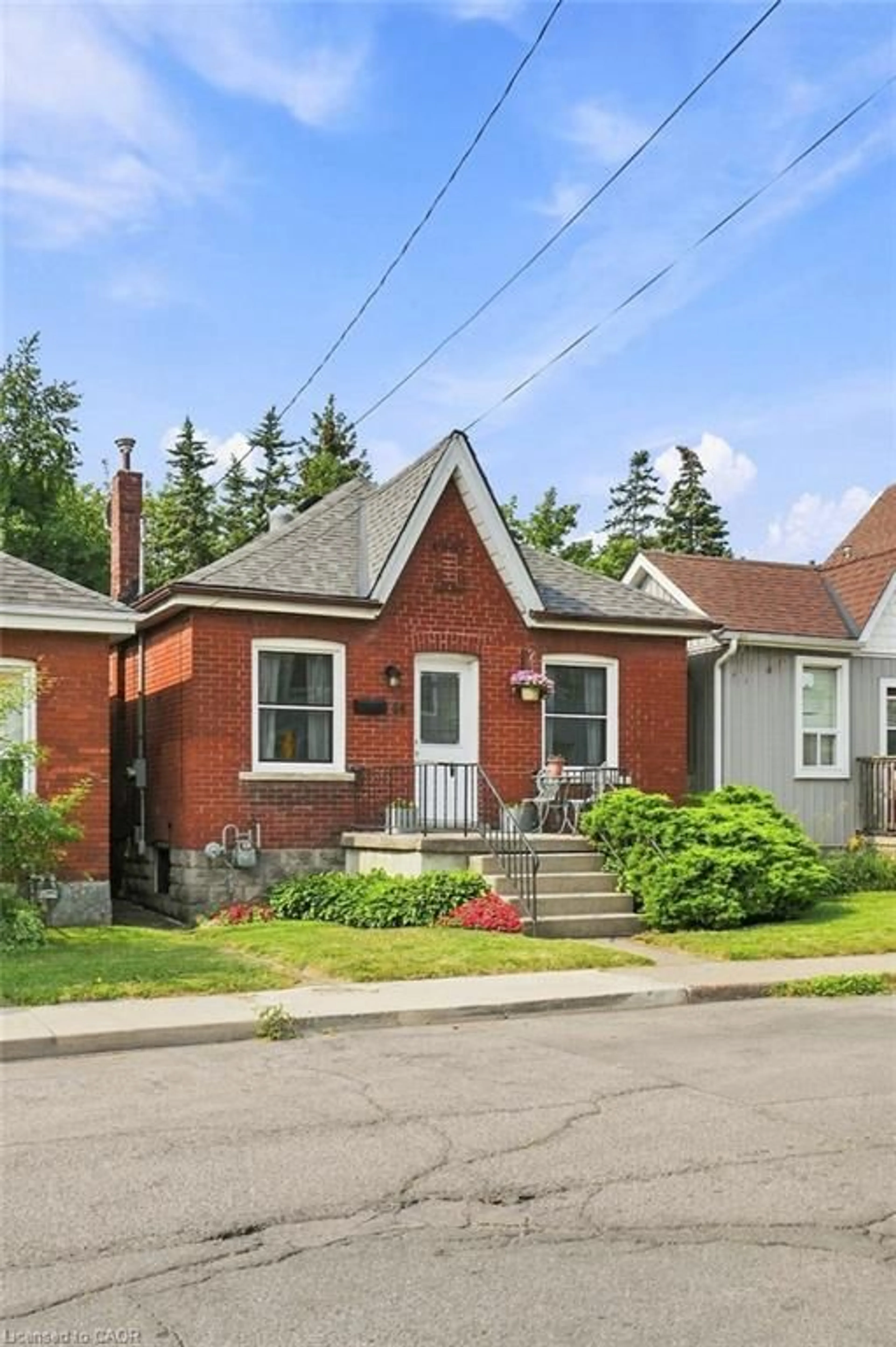 Home with brick exterior material, street for 58 Edinburgh Ave, Hamilton Ontario L8H 2C5