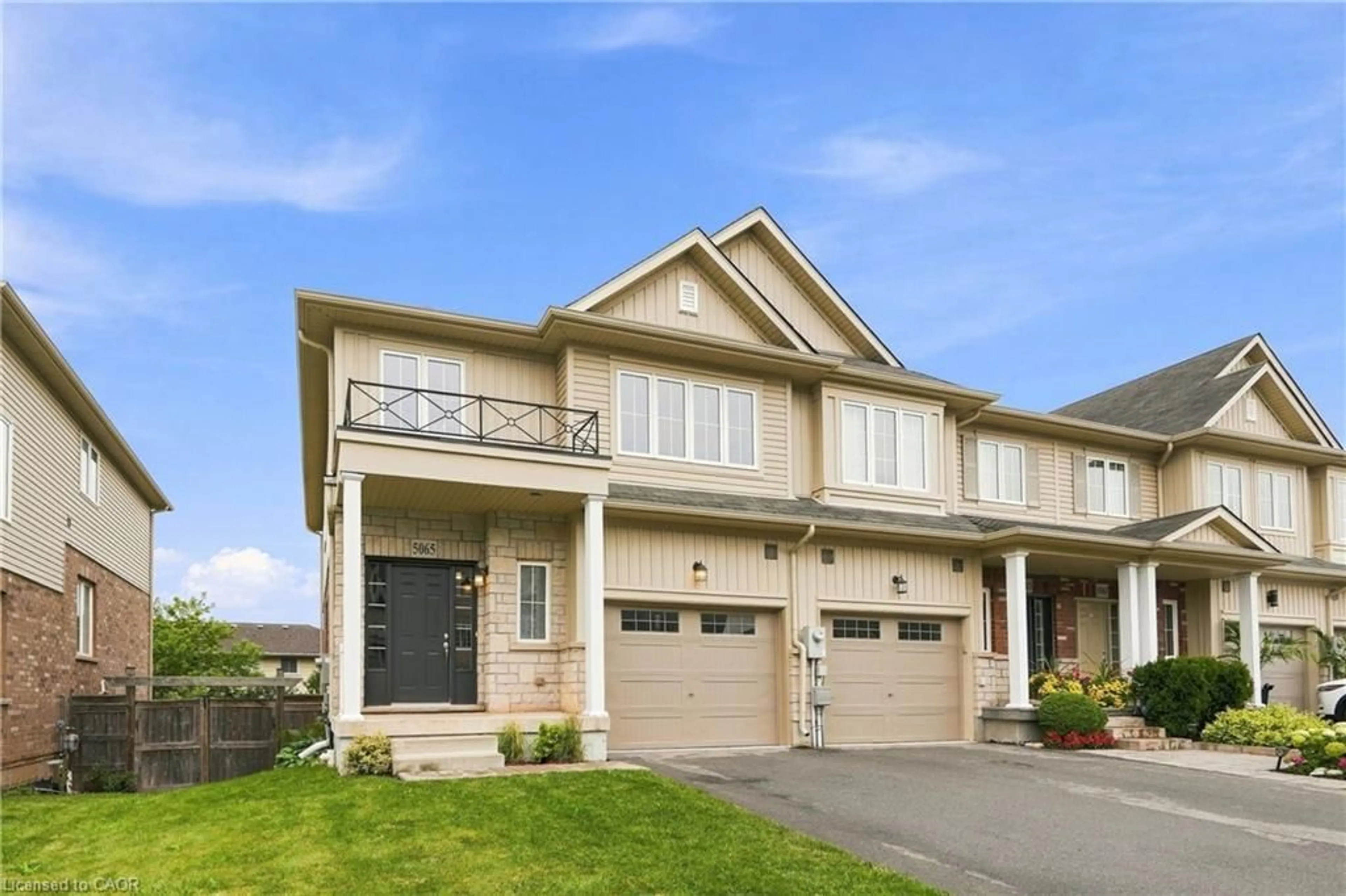 Home with vinyl exterior material, street for 5065 Serena Dr, Beamsville Ontario L3J 1W3