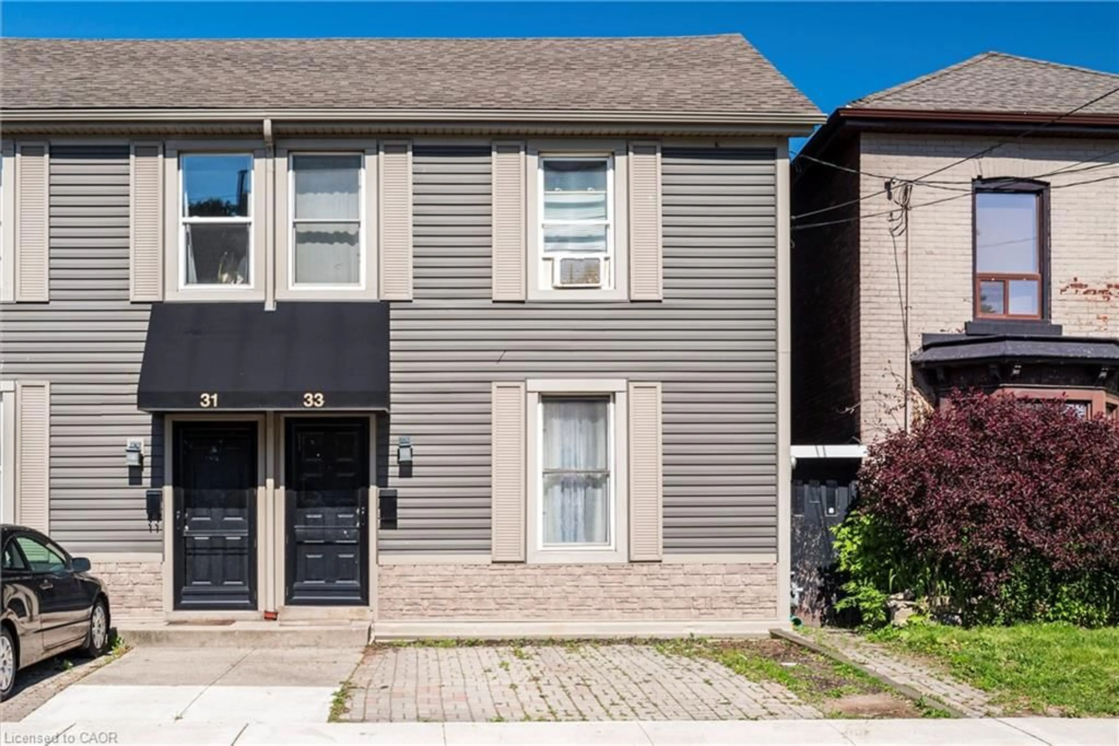 Home with brick exterior material, street for 33 Railway St, Hamilton Ontario L8R 2R4