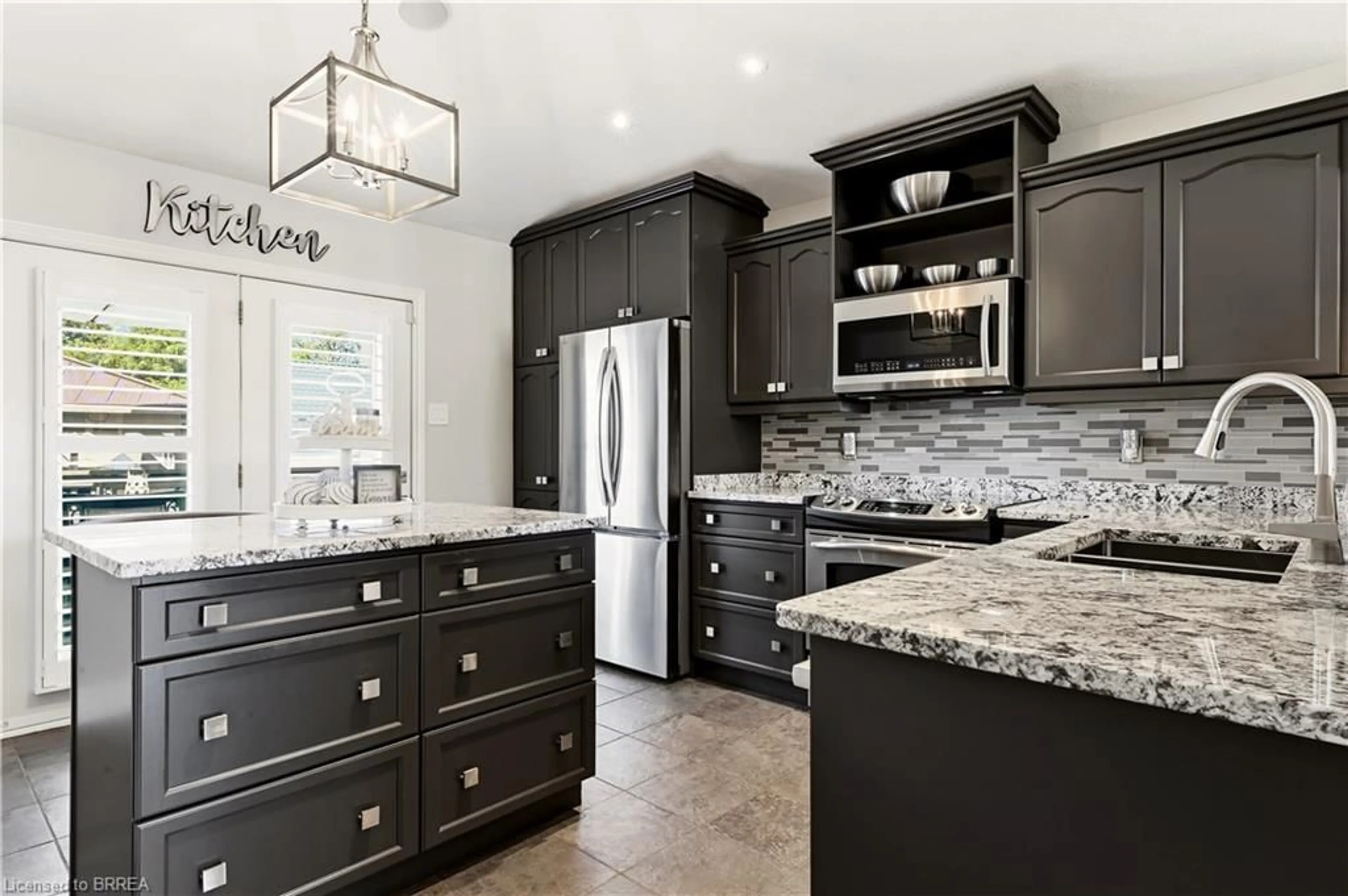 Open concept kitchen, ceramic/tile floor for 47 Deerpark Ave, Brantford Ontario N3R 8B1