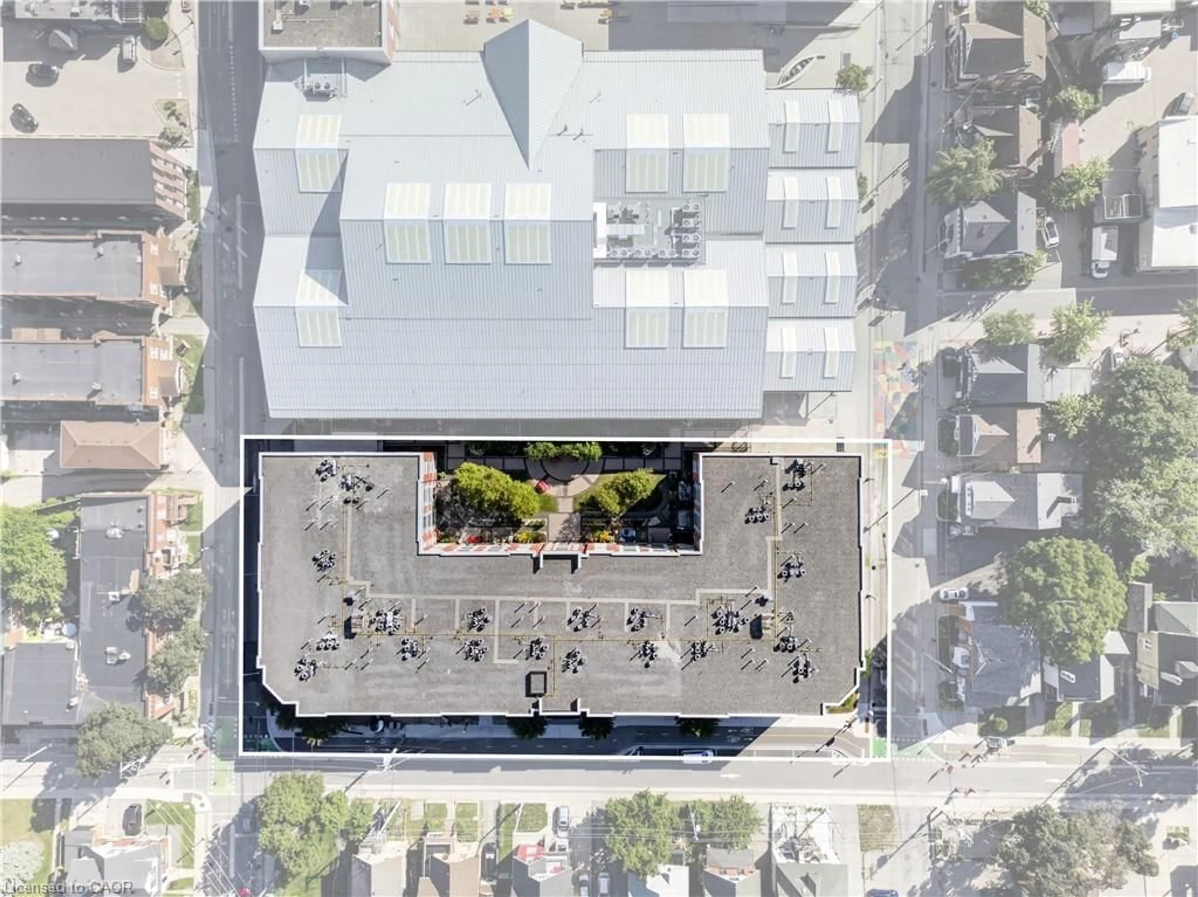 A pic from outside/outdoor area/front of a property/back of a property/a pic from drone, street for 165 Duke St #210, Kitchener Ontario N2H 6T8