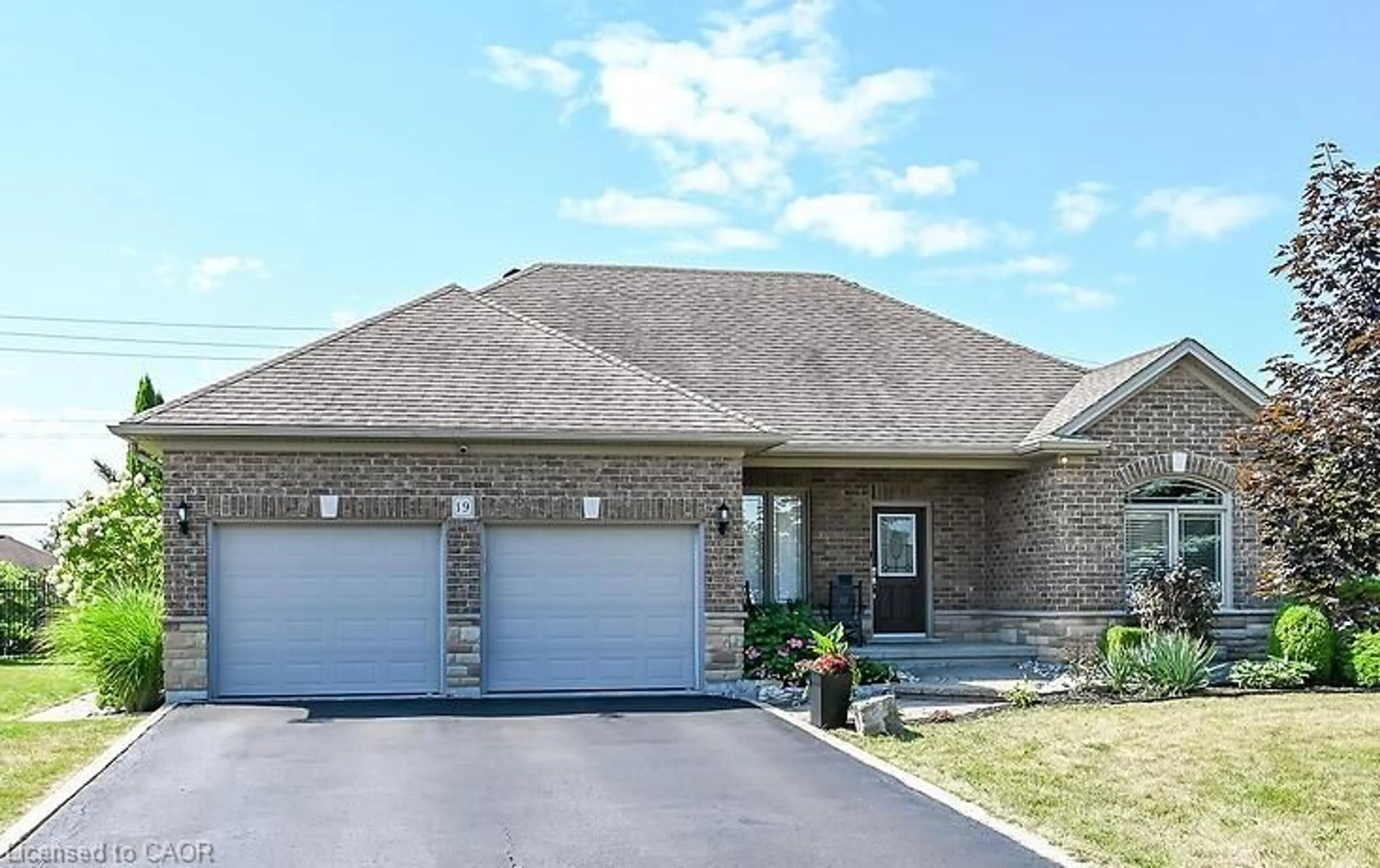 Home with brick exterior material, street for 19 Sparrow Way, Port Dover Ontario N0A 1N5