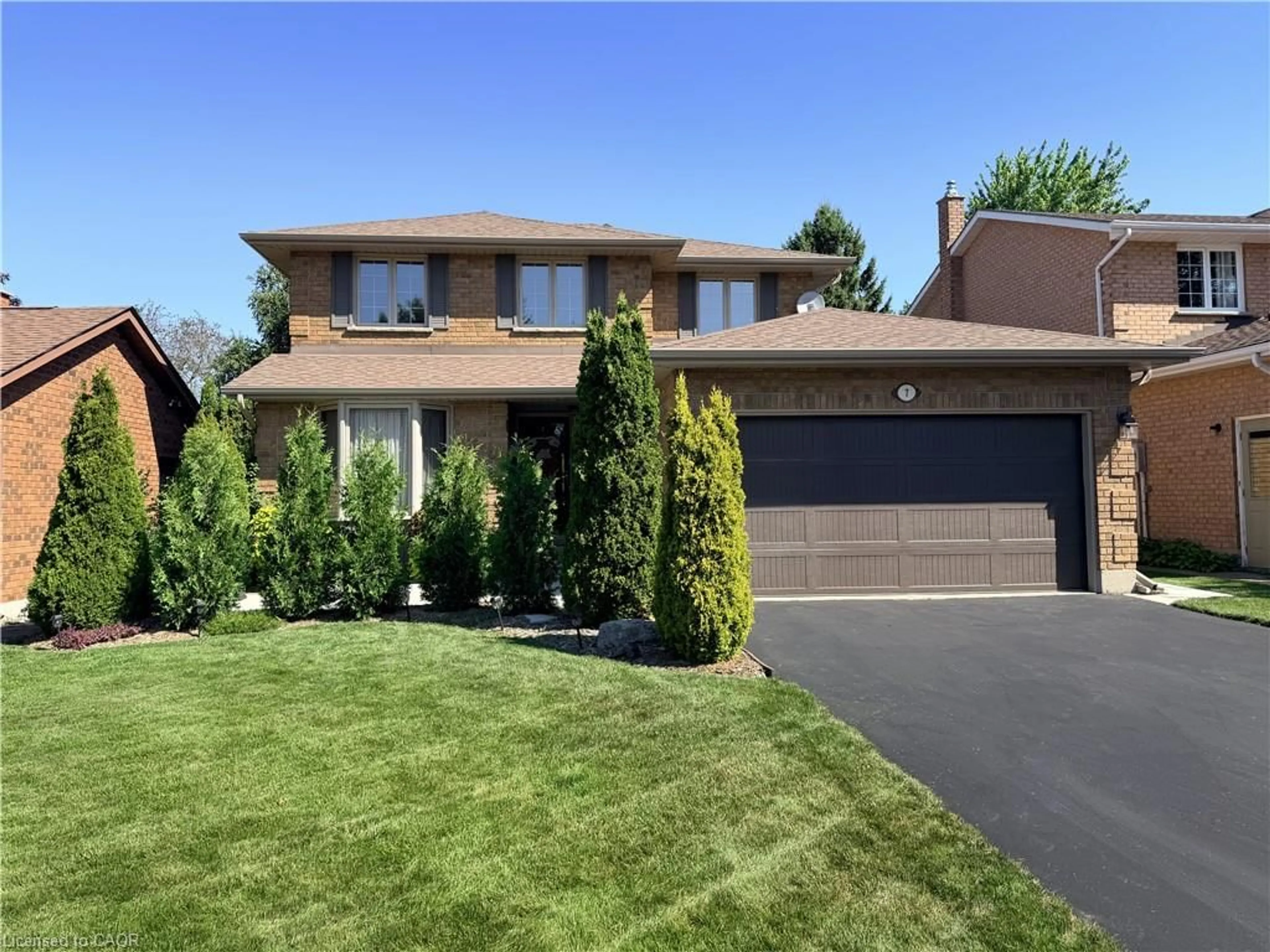 Home with brick exterior material, street for 7 Mann Ave, Simcoe Ontario N3Y 5J3
