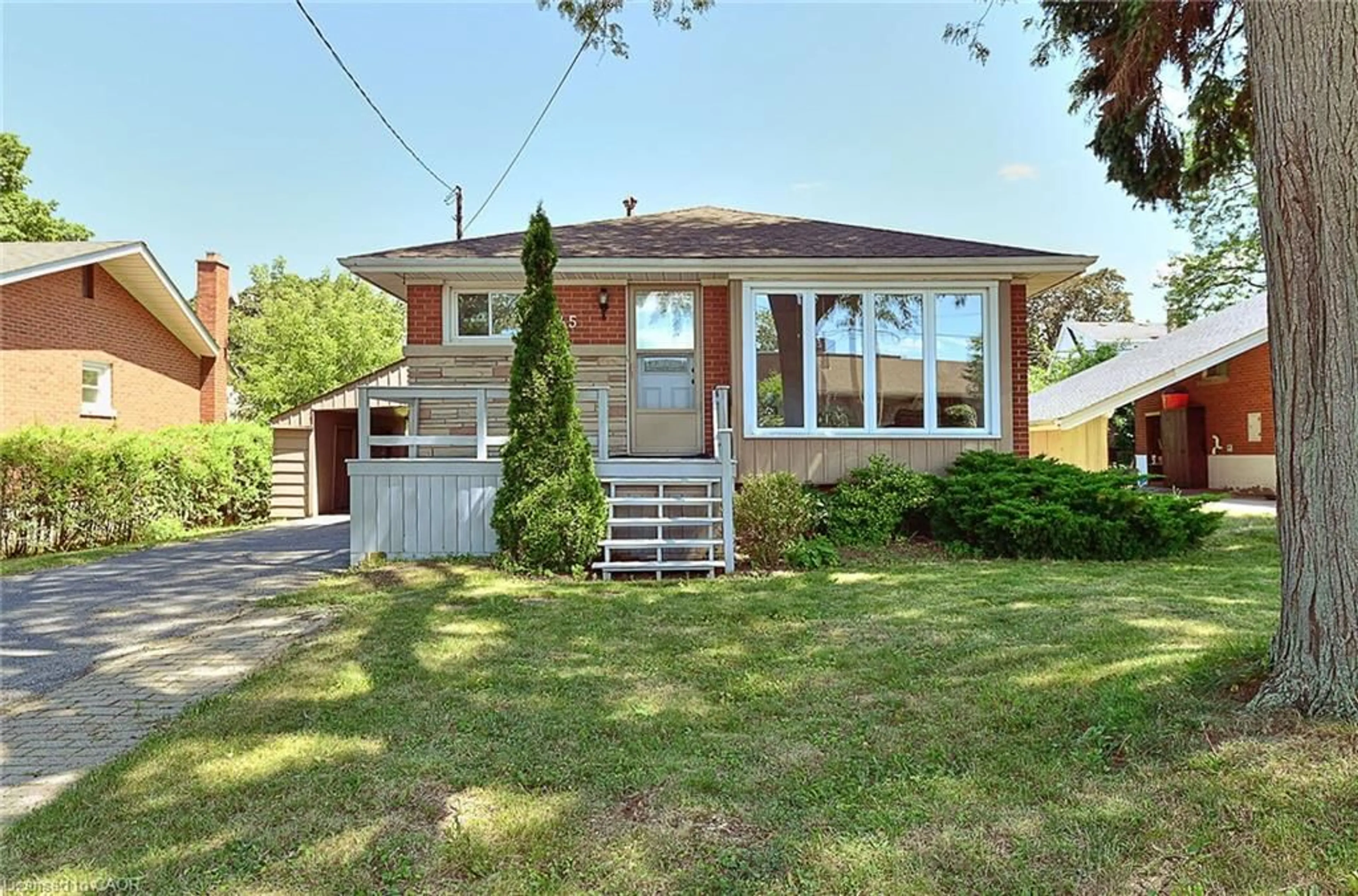 Home with brick exterior material, street for 245 West 33rd St, Hamilton Ontario L9C 5J7