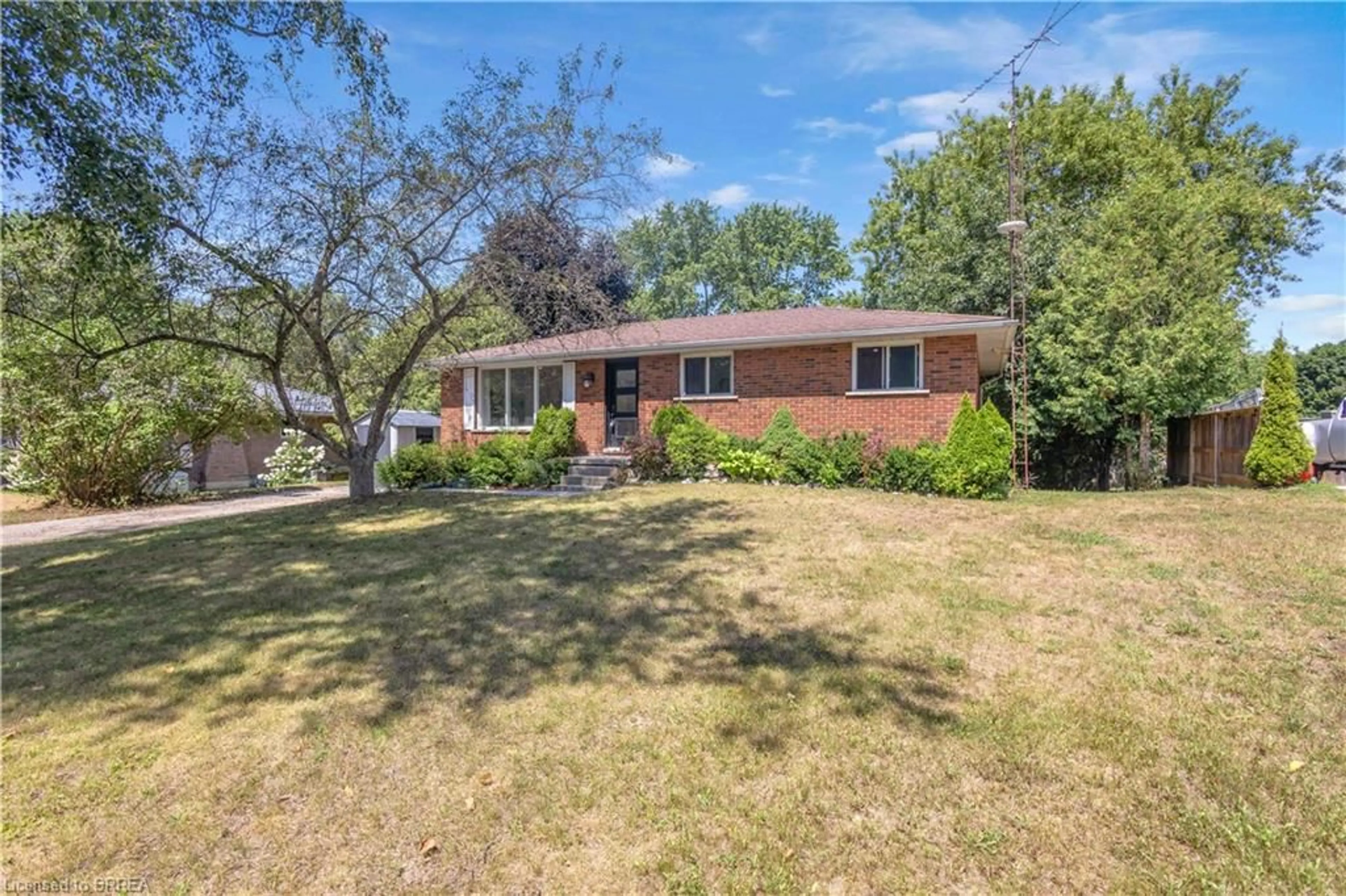 Home with brick exterior material, street for 30 Ridgeway Ave, Simcoe Ontario N3Y 4J9