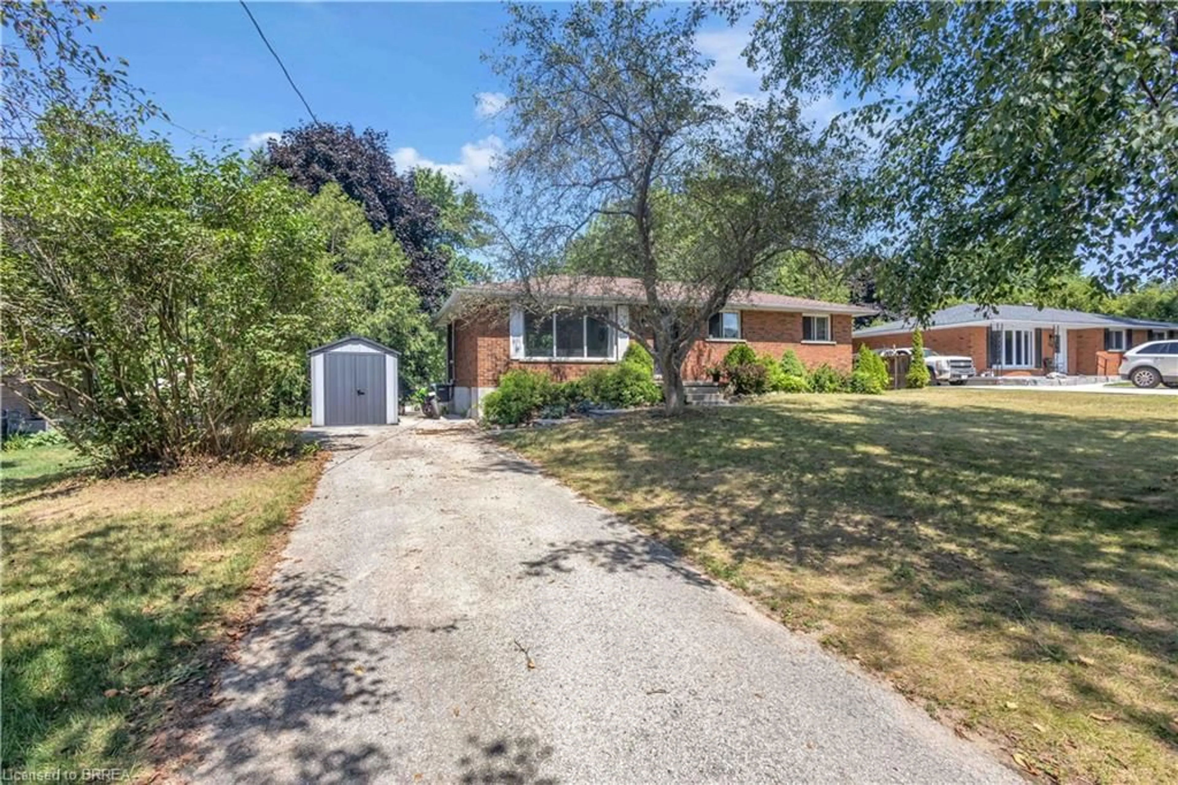 Home with brick exterior material, street for 30 Ridgeway Ave, Simcoe Ontario N3Y 4J9