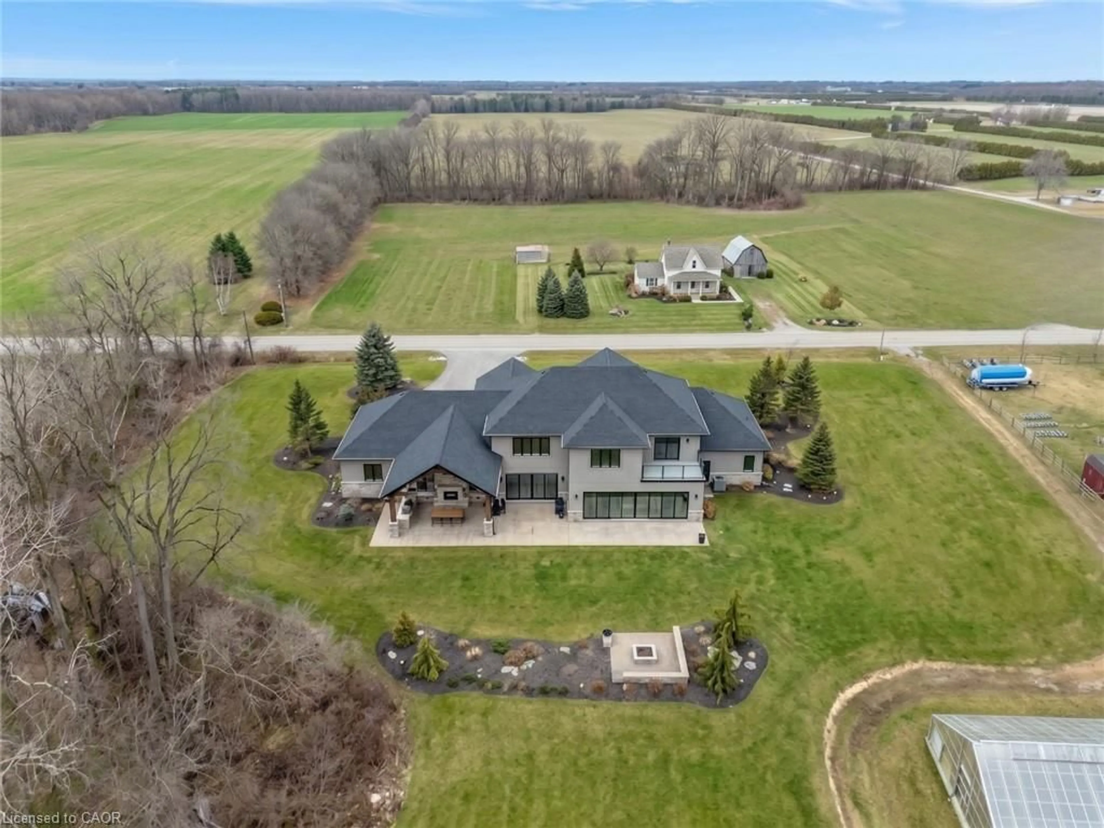 A pic from outside/outdoor area/front of a property/back of a property/a pic from drone, unknown for 1135 Norfolk Cty Rd 19 W, Vanessa Ontario N0E 1V0
