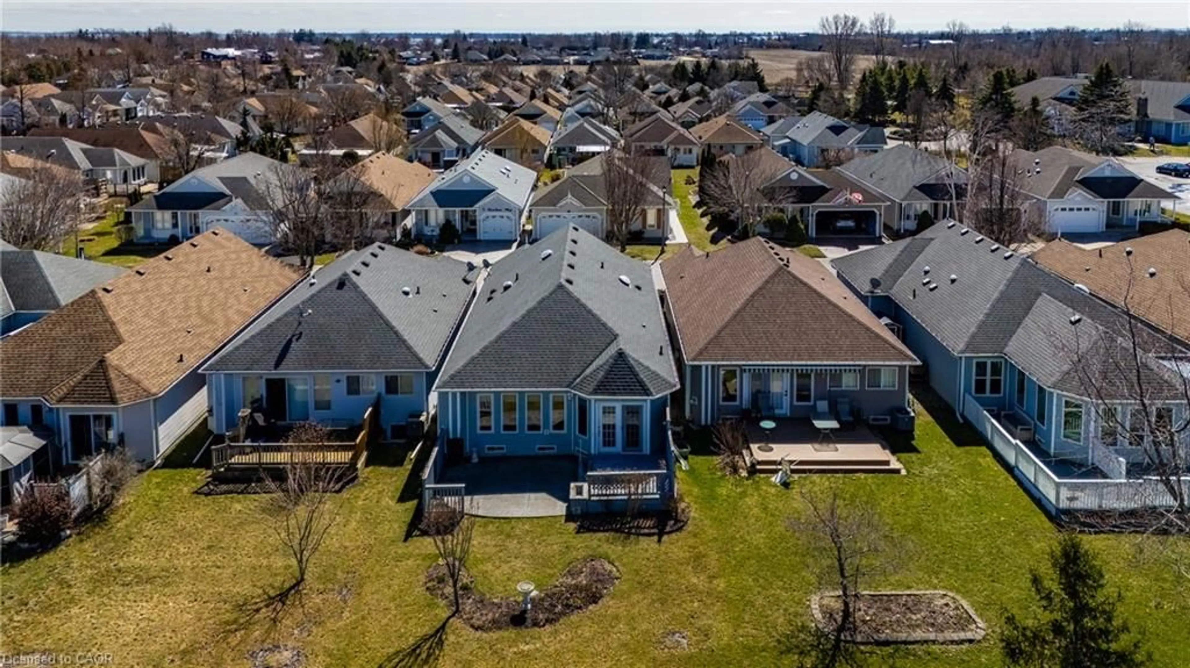 A pic from outside/outdoor area/front of a property/back of a property/a pic from drone, street for 18 Carolina Way, Port Rowan Ontario N0E 1M0