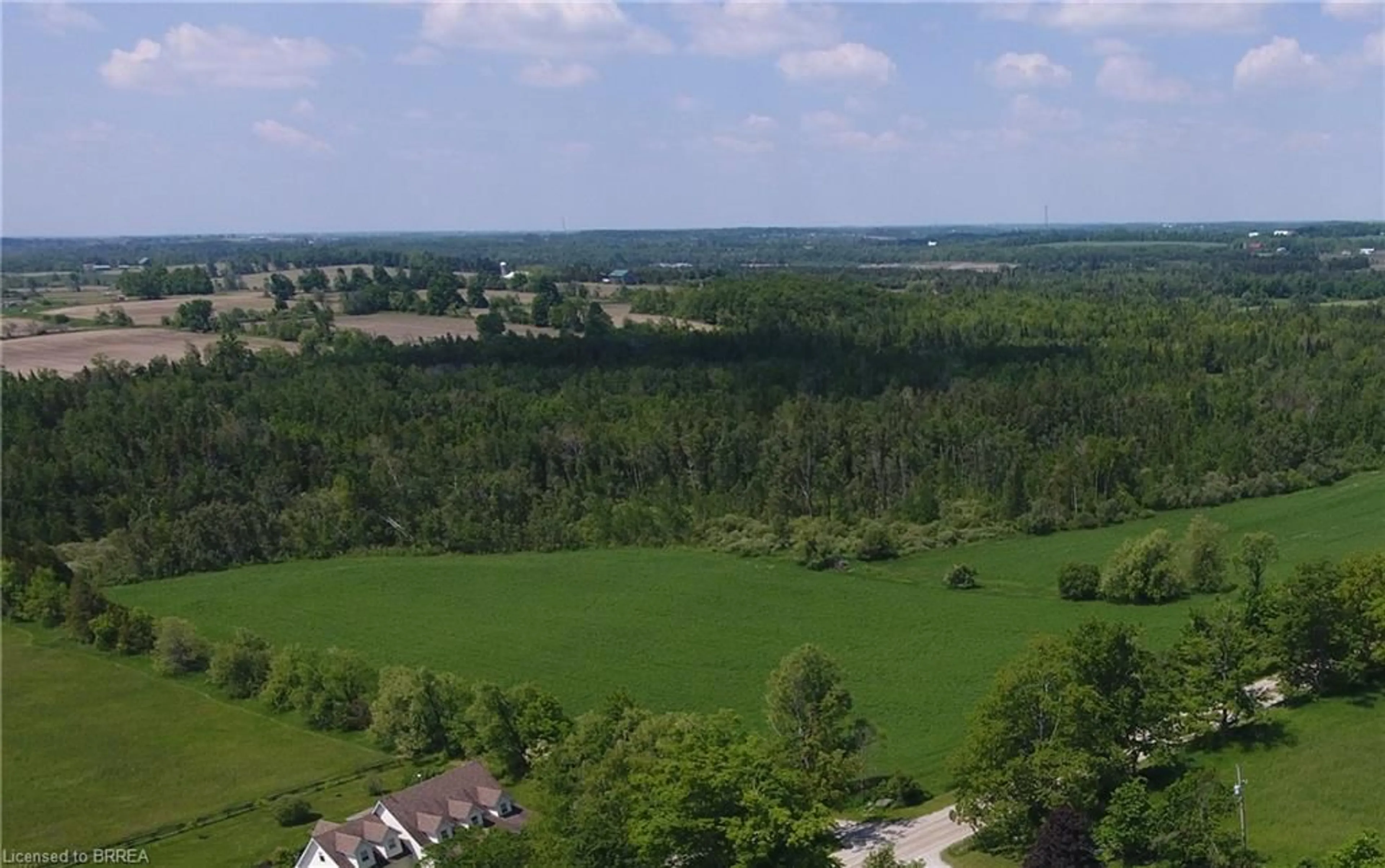 A pic from outside/outdoor area/front of a property/back of a property/a pic from drone, forest/trees view for 5224 Third Line, Acton Ontario L7J 2L8