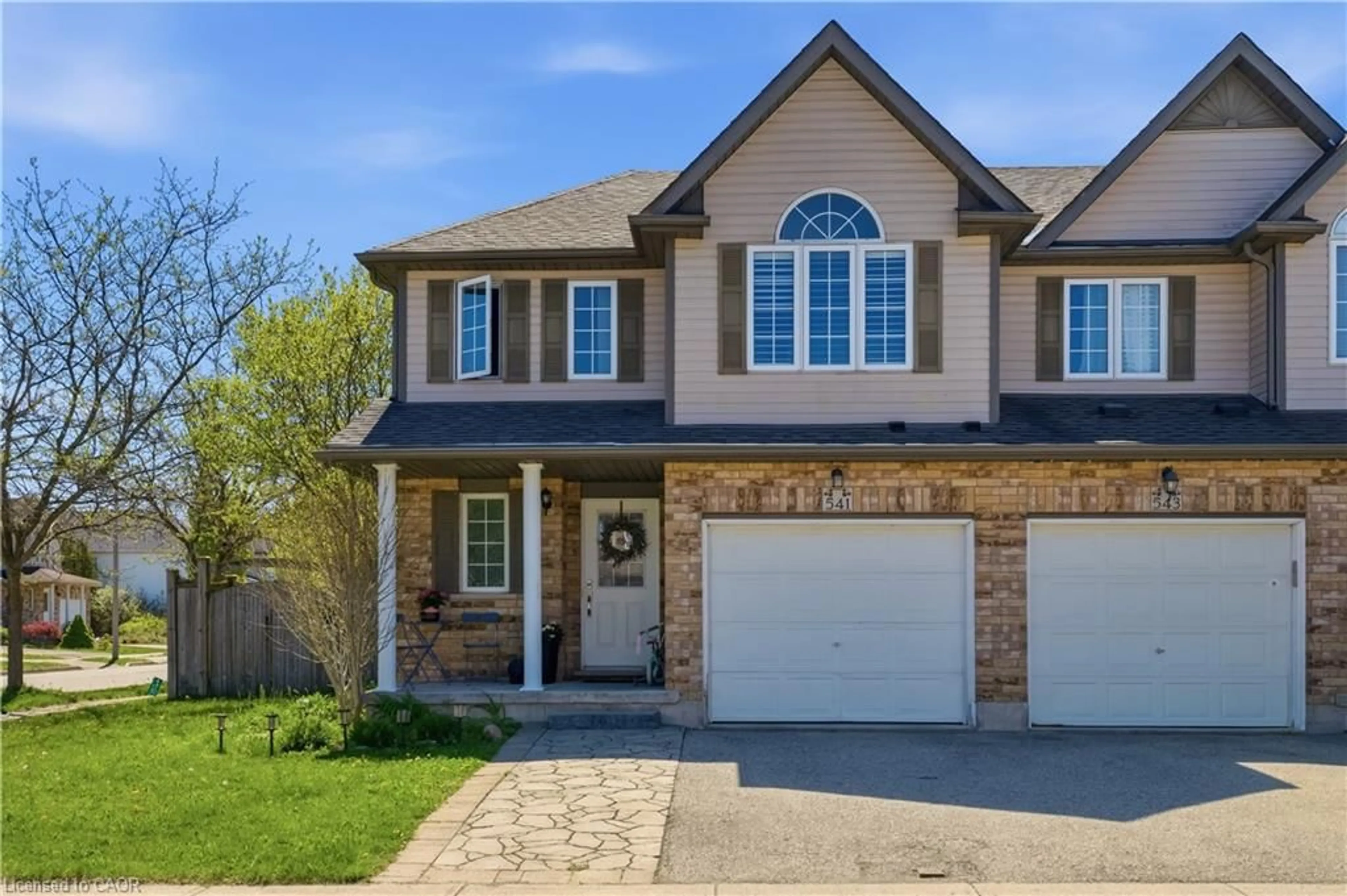 Home with brick exterior material, street for 541 Wild Iris Ave, Waterloo Ontario N2V 2W4