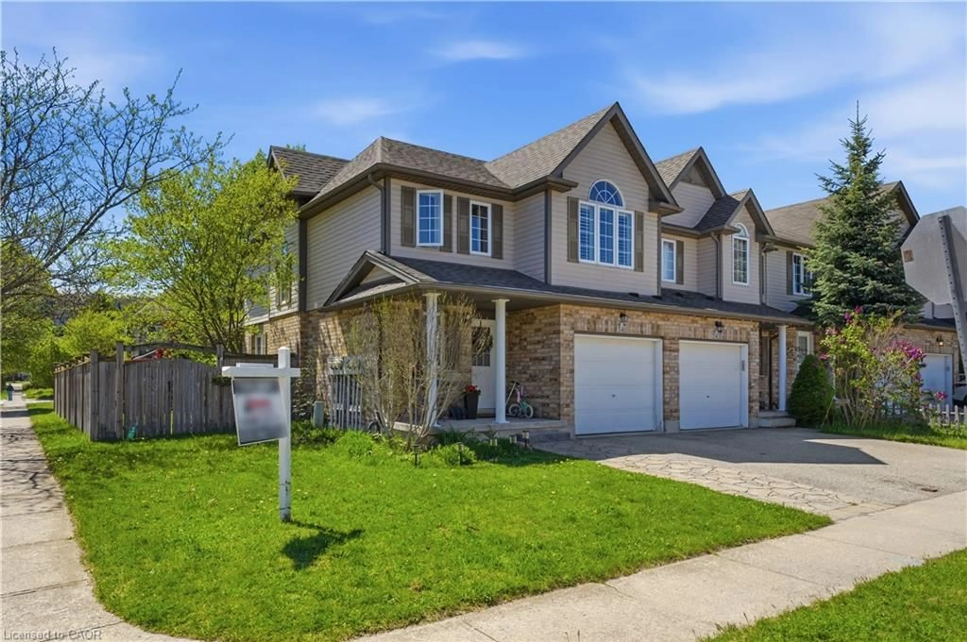 Home with brick exterior material, street for 541 Wild Iris Ave, Waterloo Ontario N2V 2W4