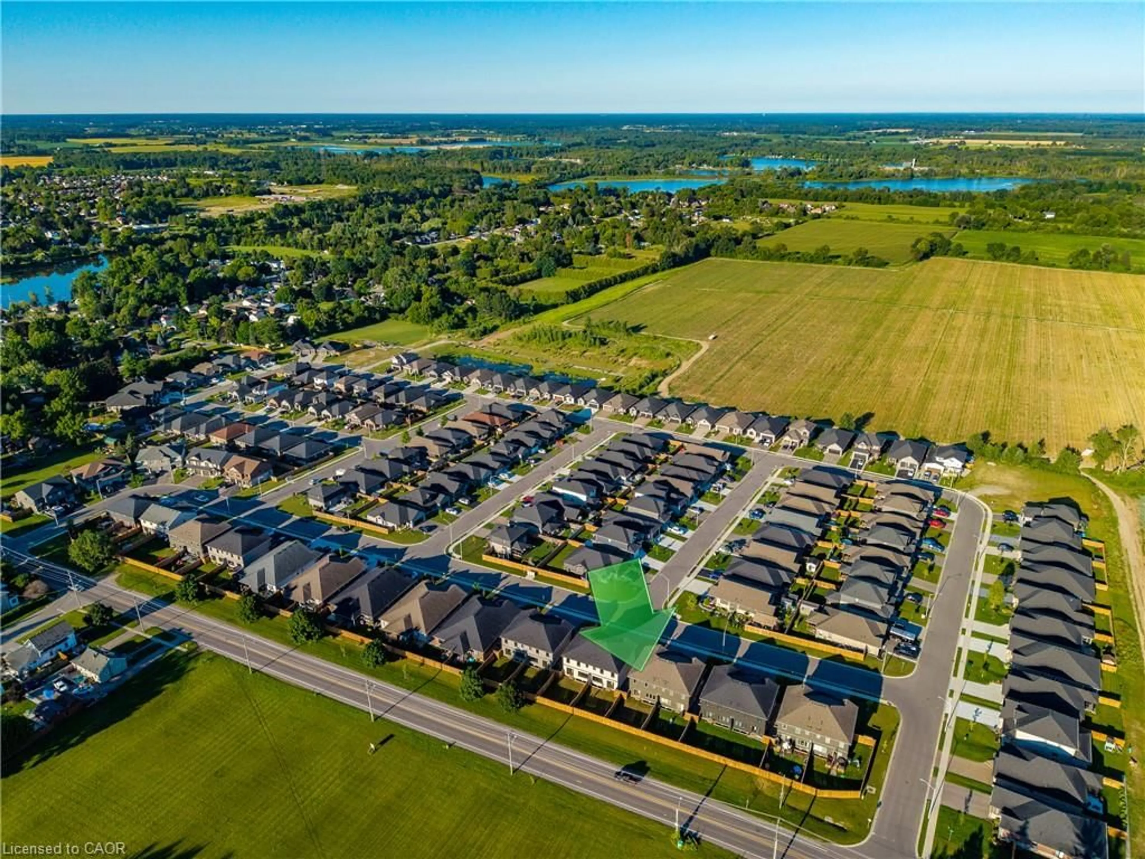 A pic from outside/outdoor area/front of a property/back of a property/a pic from drone, water/lake/river/ocean view for 115 Amber St, Waterford Ontario N0E 1Y0