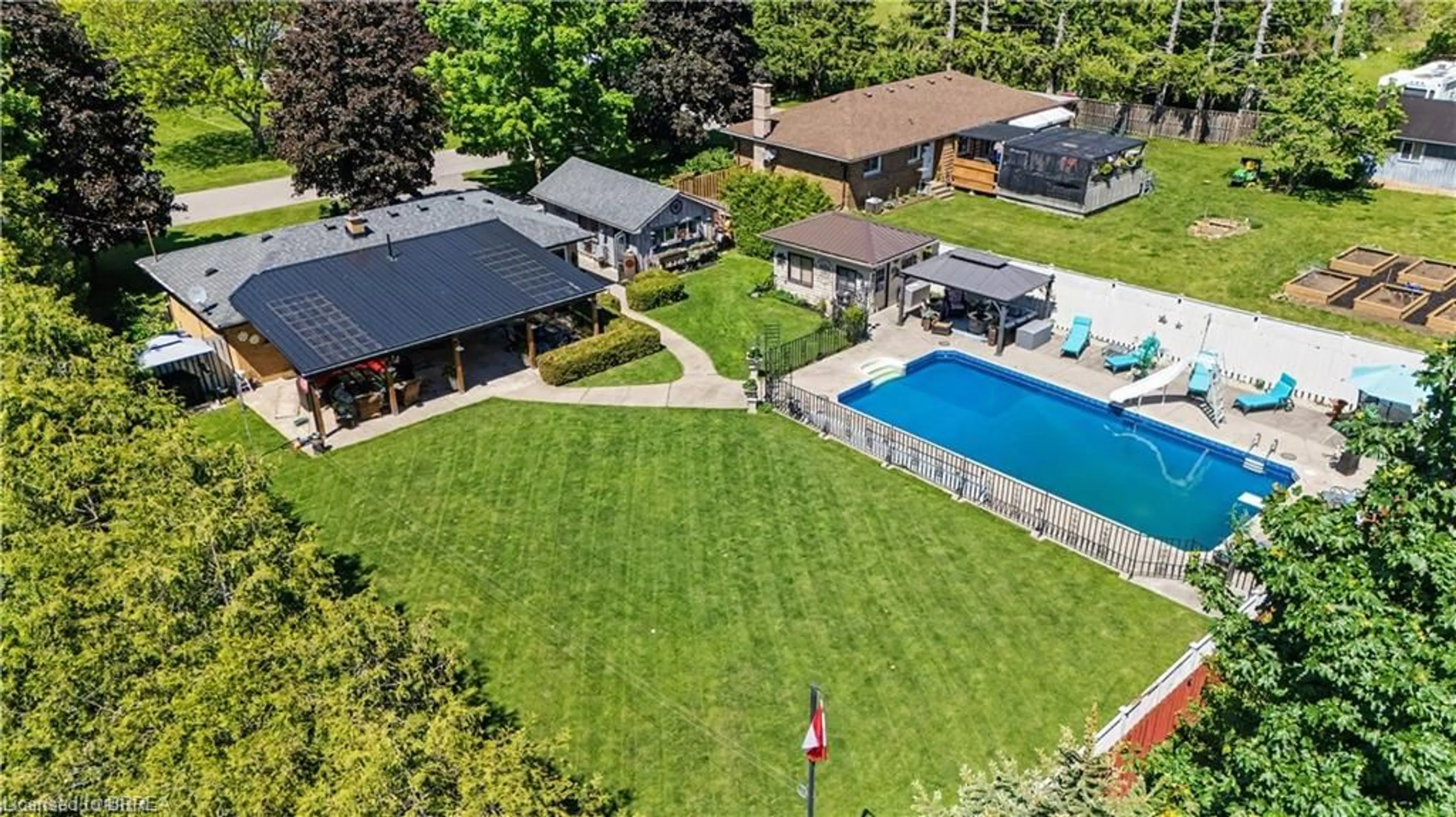 A pic from outside/outdoor area/front of a property/back of a property/a pic from drone, unknown for 52 Lorne Ave, Burford Ontario N0E 1A0